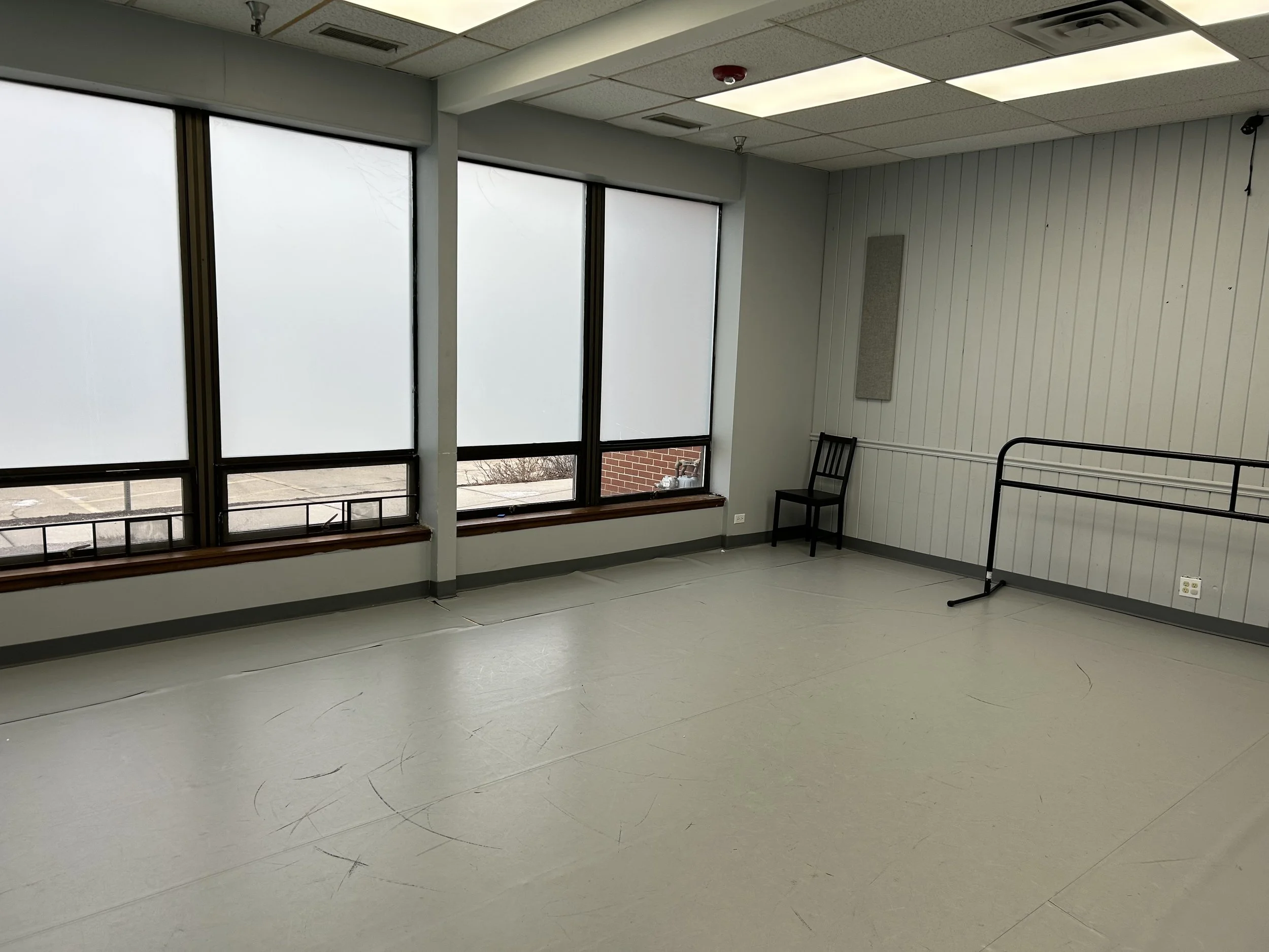 374 sq ft (17’x22’) | marley floor | portable center barre | one wall of large windows | stereo system