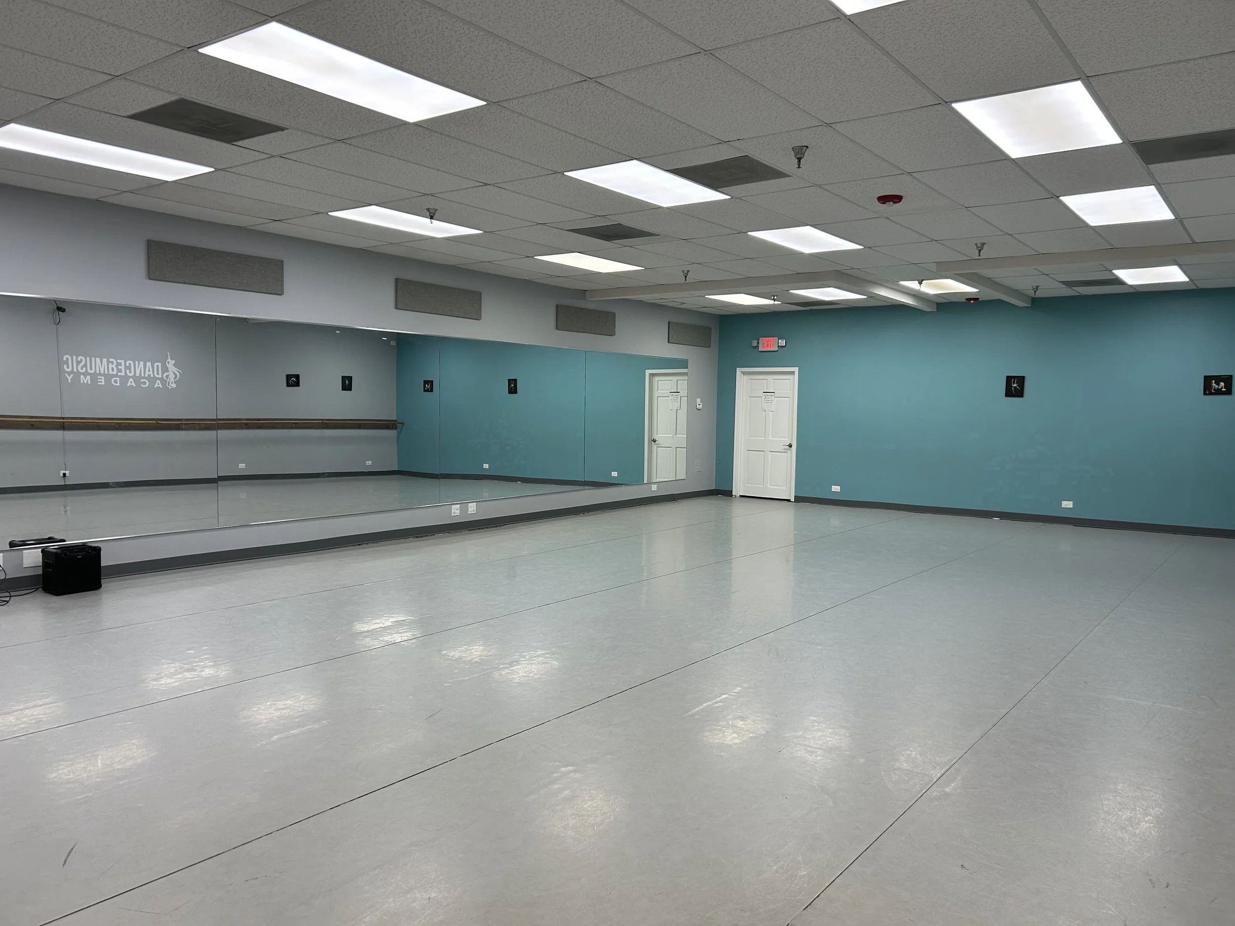 1456 sq ft (52’x28’) | sprung marley floors | full wall of mirrors | full wall of ballet barres | portable center barres | stereo system