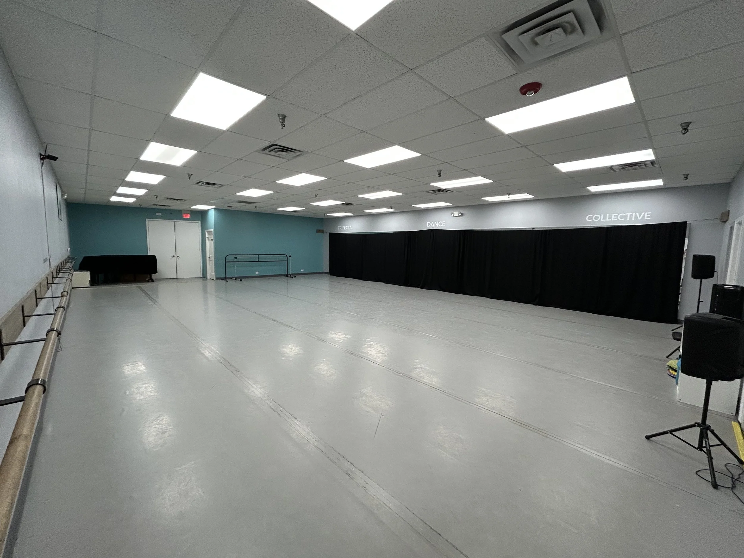 1530 sq ft (45’x34’) | sprung marley floors | full wall of coverable mirrors | wall of ballet barres | portable center barres | stereo system
