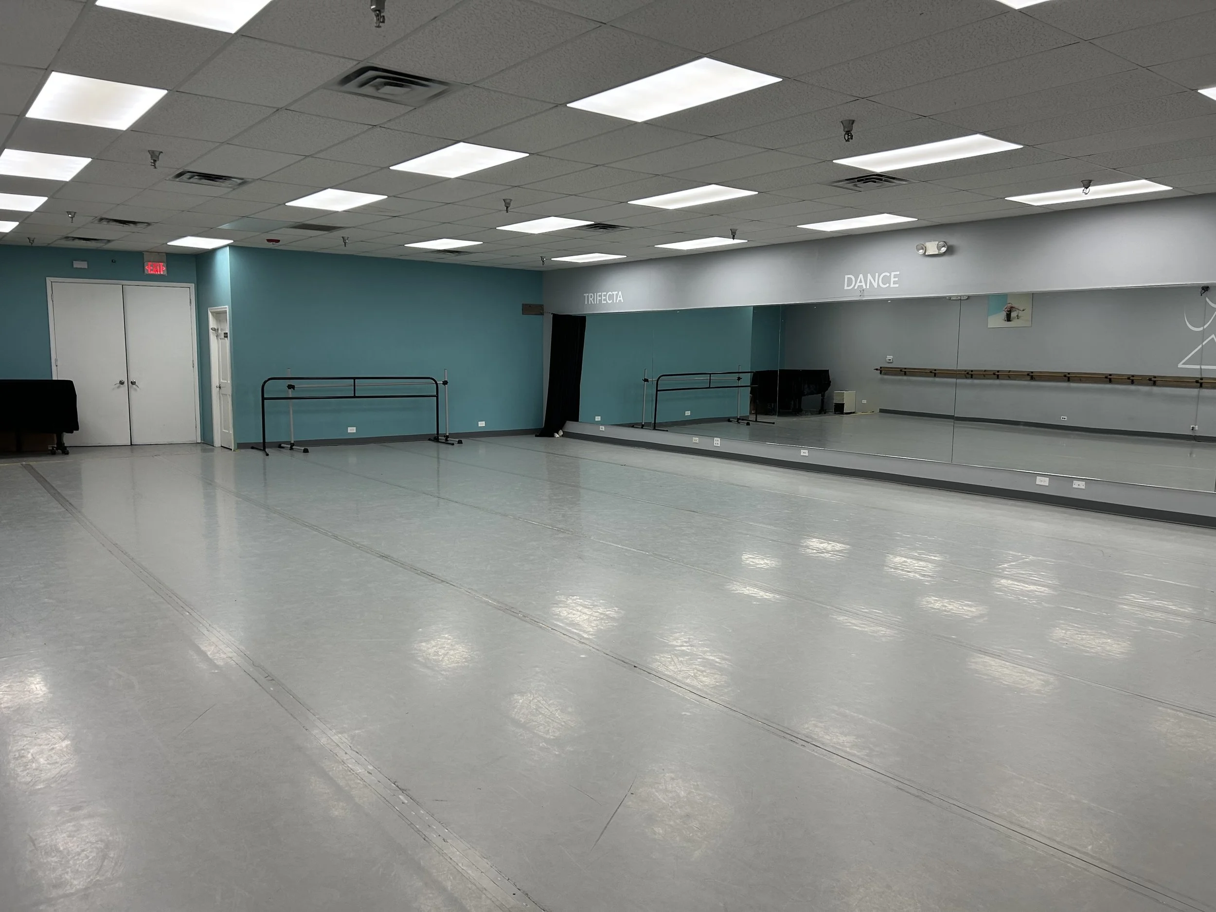 1530 sq ft (45’x34’) | sprung marley floors | full wall of coverable mirrors | wall of ballet barres | portable center barres | stereo system