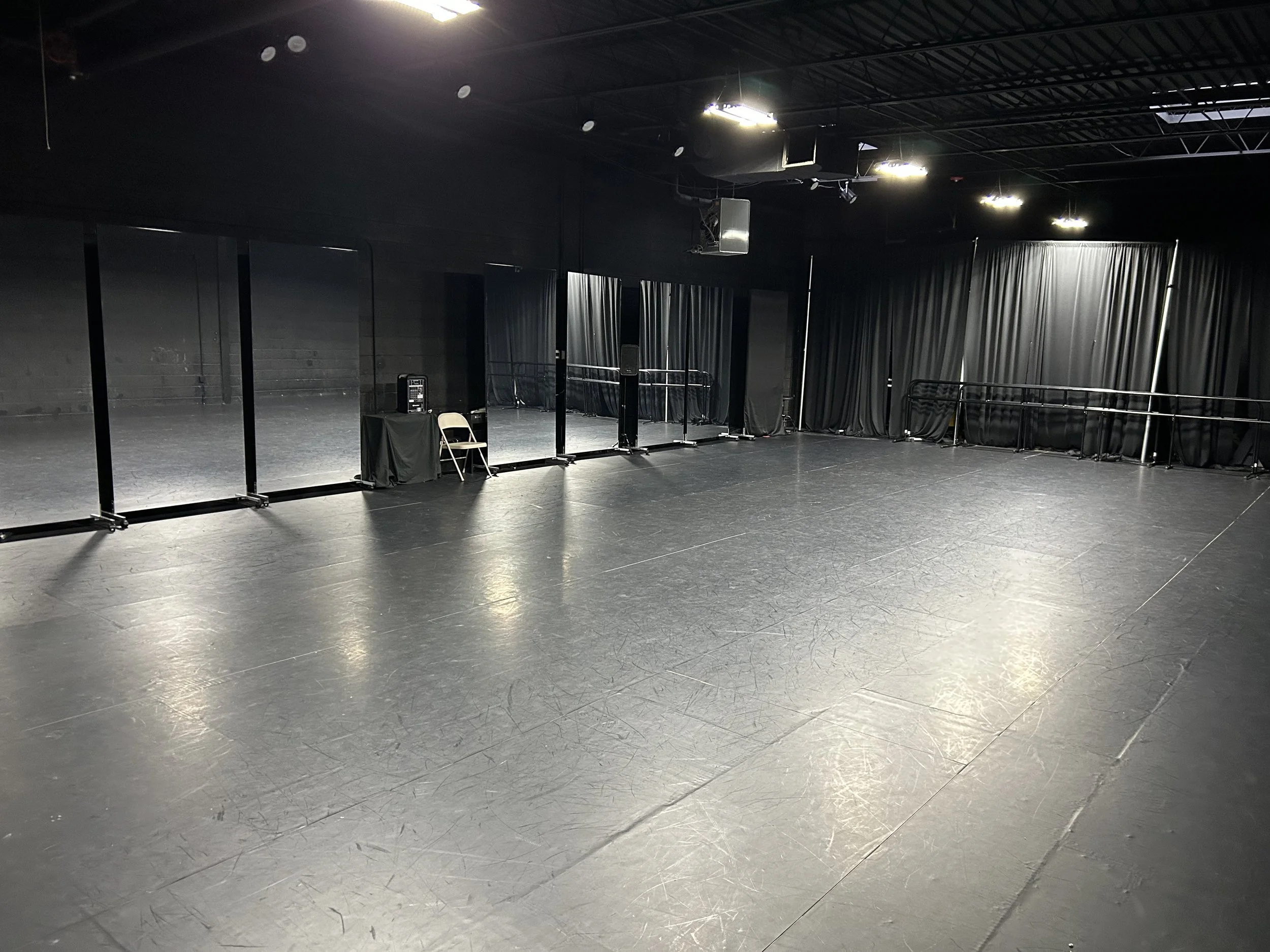 1,944 sq ft (54’x36’) | black marley floors | portable mirrors | portable center barres | stereo system | LED lighting system
