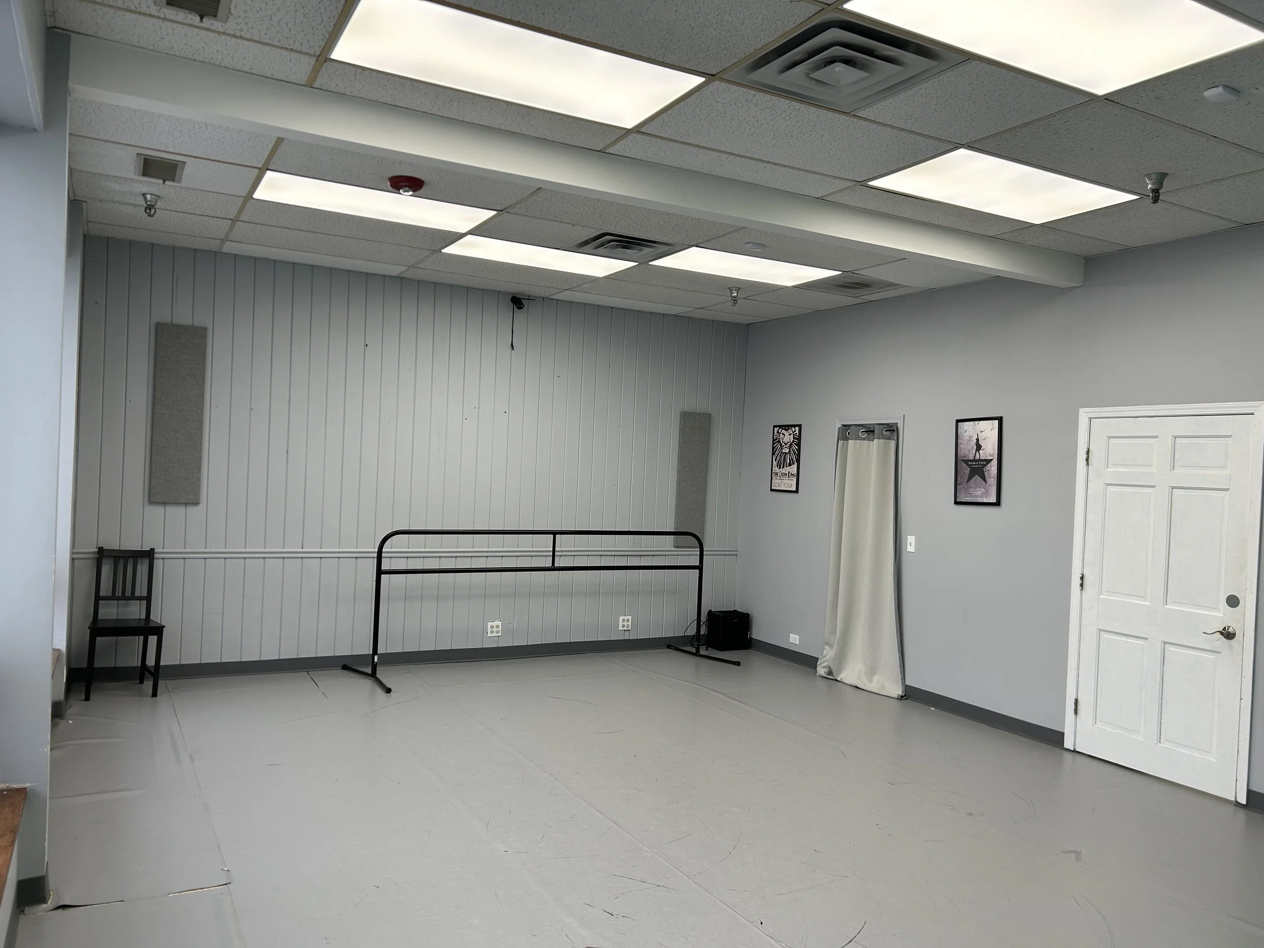 374 sq ft (17’x22’) | marley floor | portable center barre | one wall of large windows | stereo system