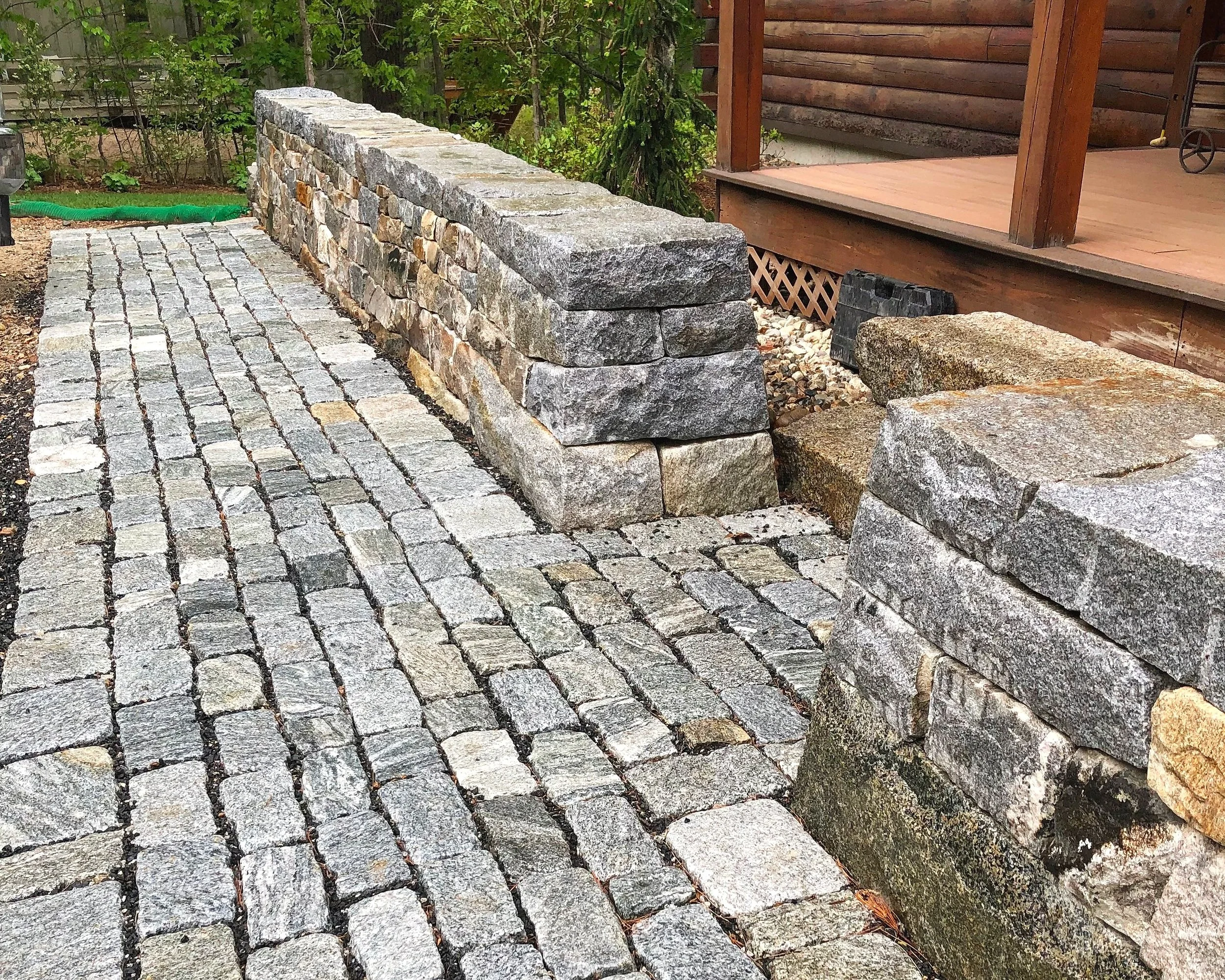 Granite entrance walls with Green Monster Landscapes. Wakefield, NH