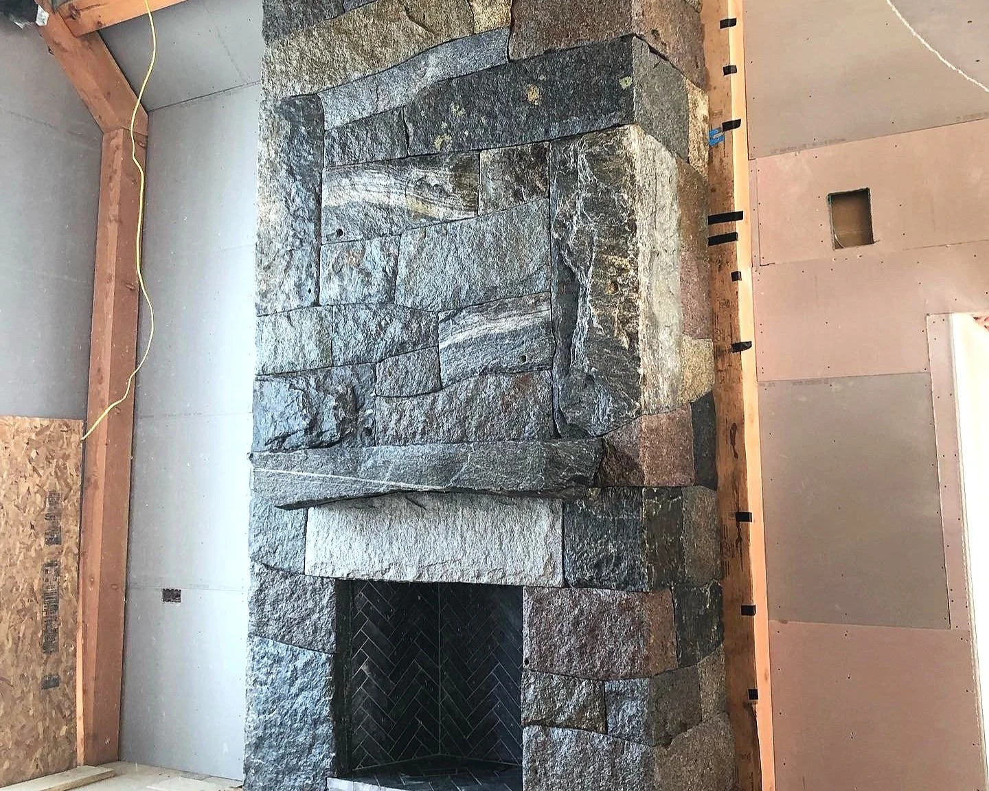 Granite fireplace with Rob Farone. Westport, MA