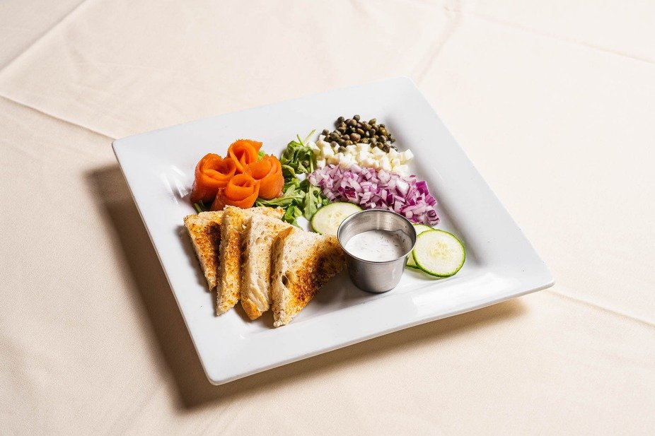Savor the elegance of our artfully prepared dish, featuring smoked salmon and exquisite accompaniments.

#Table13 #DallasEats #SteakhouseDining #ArtfullyPrepared #SeafoodDelight