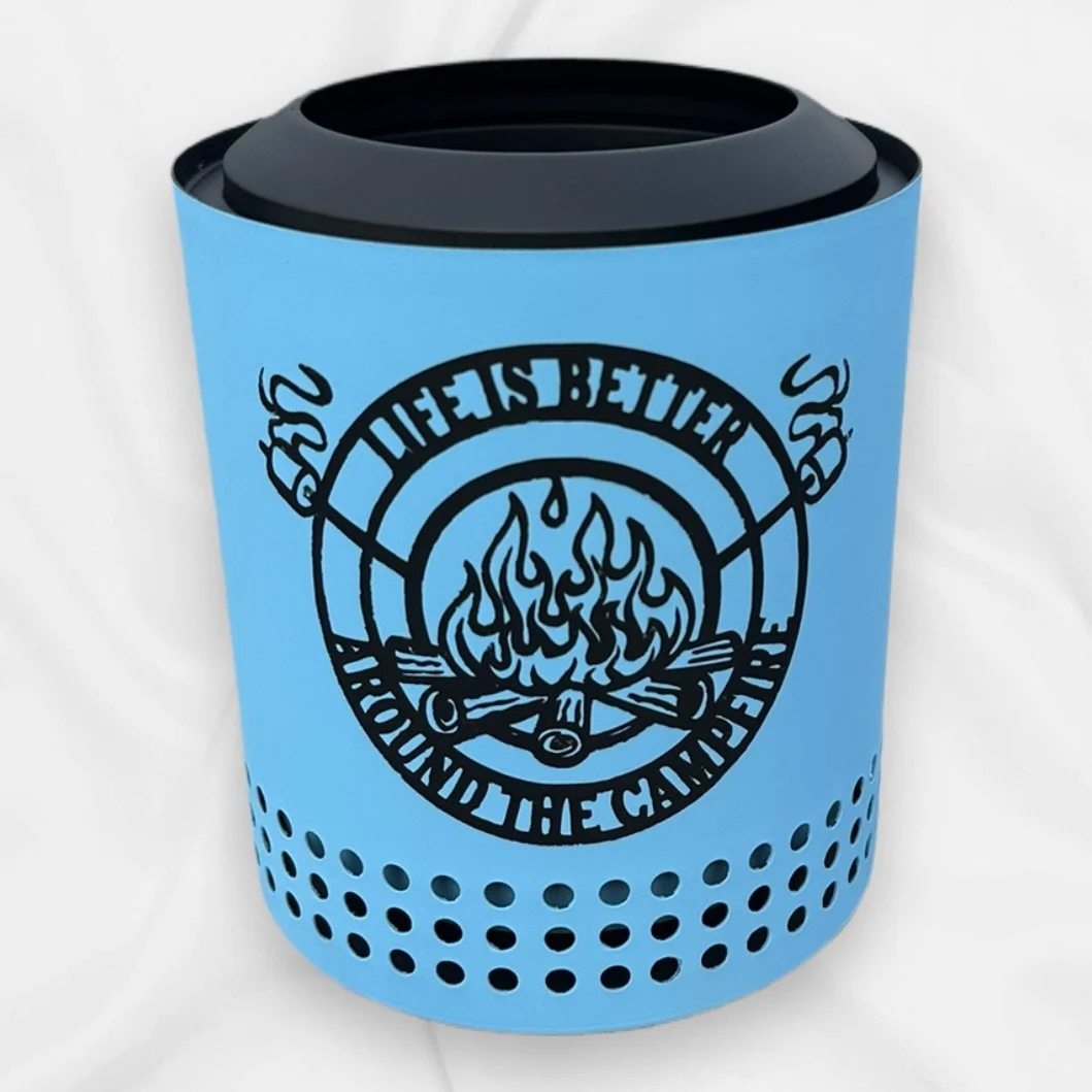 Blue smoke alarm with black grill and logo of a camping fire surrounded by text 'SDS', 'STAY BEHIND', 'ASACT THE CHEAD' printed in black.