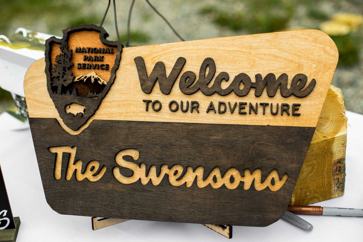 A cute custom wooden sign made in the style of the US Forest Service signs.