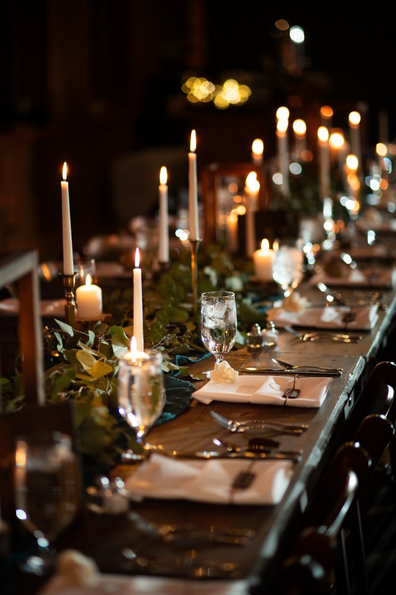 detail photo of a candlelit reception tablescape.