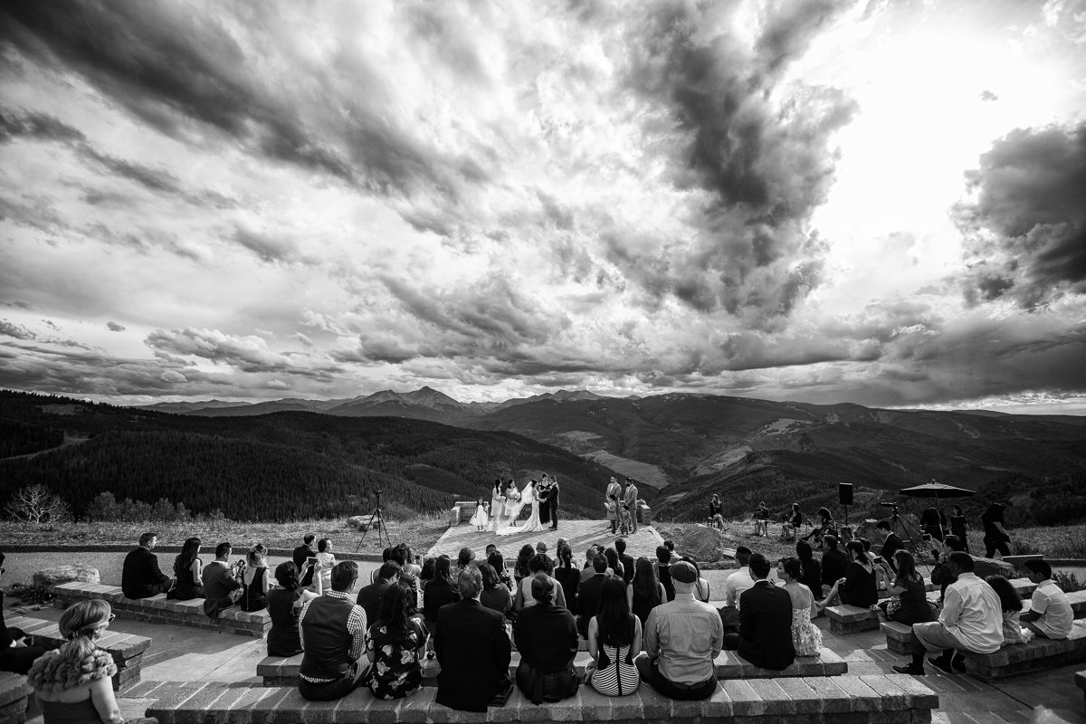 Vail Wedding Deck photo view from above. Wide angle. Black and white. with dramatic clouds and peaks.