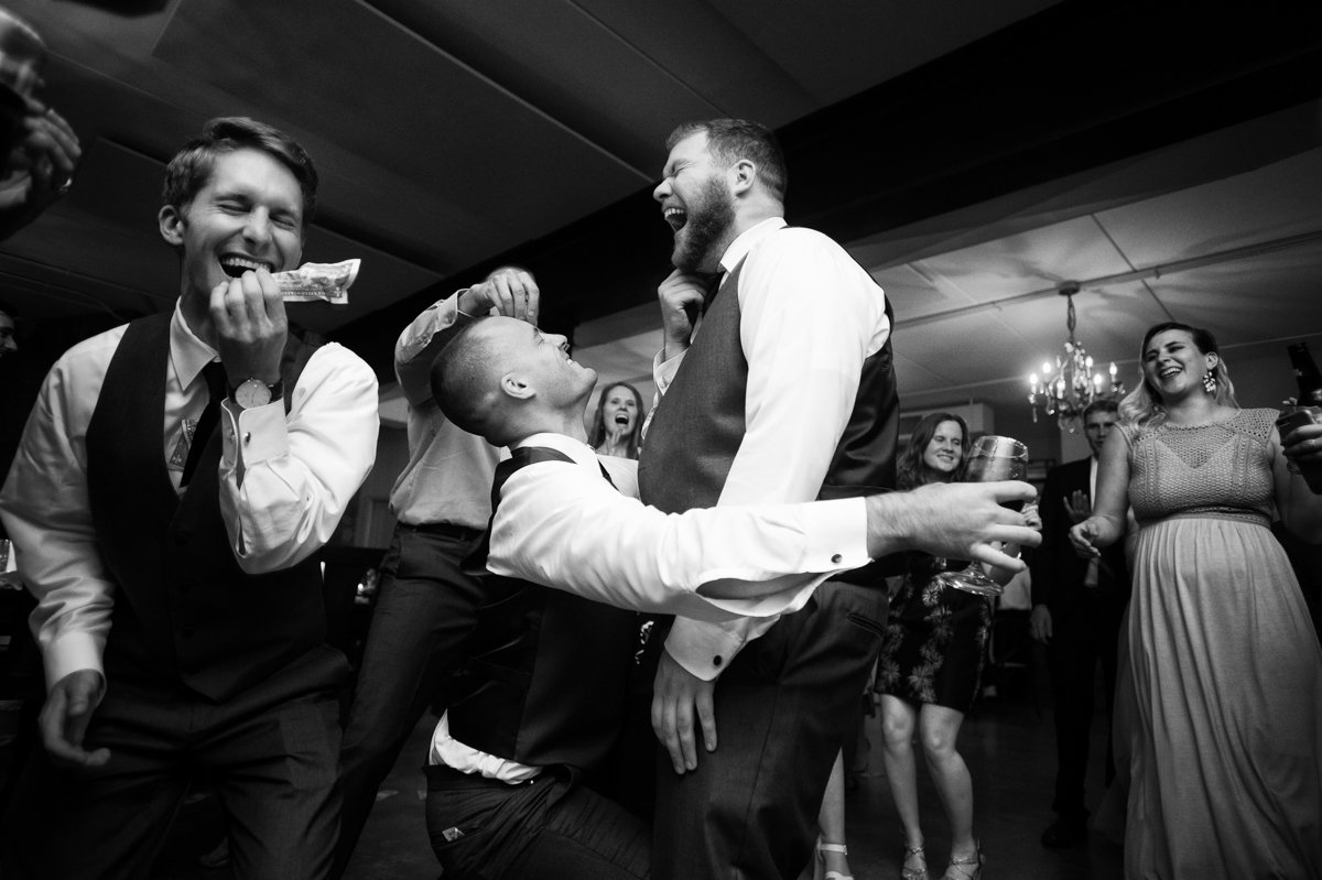Groomsmen get rowdy on the dance floor.