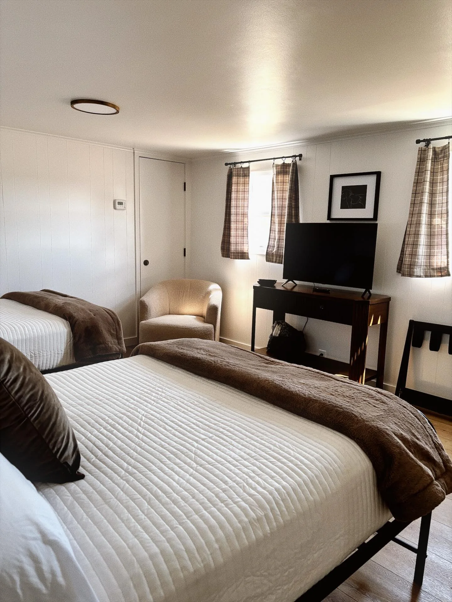 No two rooms are the same.  It&rsquo;s not something we planned for at Motel Miles, it just sort of happened. The beds all have the same bedding, but we have several different bed frames. Some of the furniture matches, but we also thrifted and up-cyc