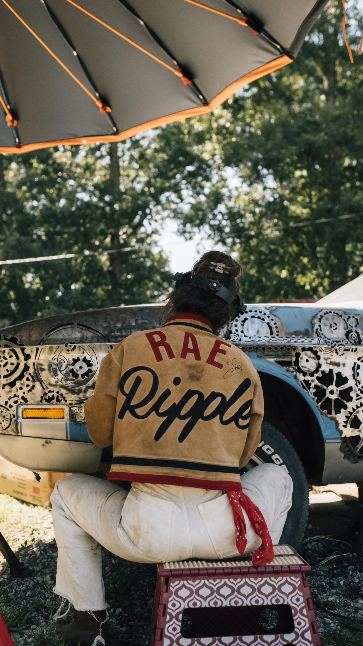 Rae Ripple working on a hand cut art car