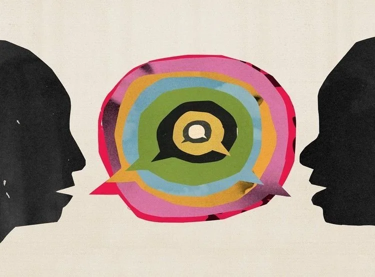 Silhouettes of two people facing each other with a colorful speech bubble containing a chat icon between them.