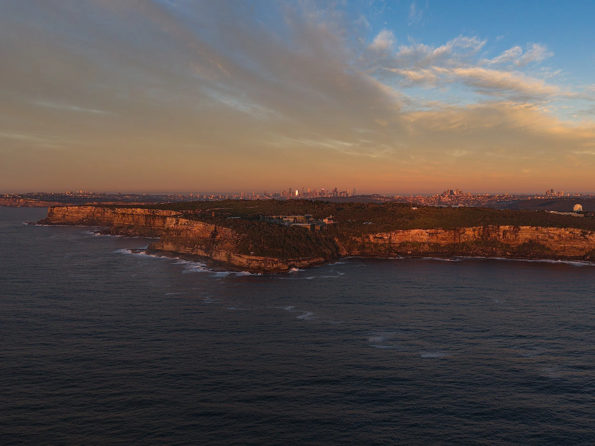 Red cliffs in the morning. Manly NSW
