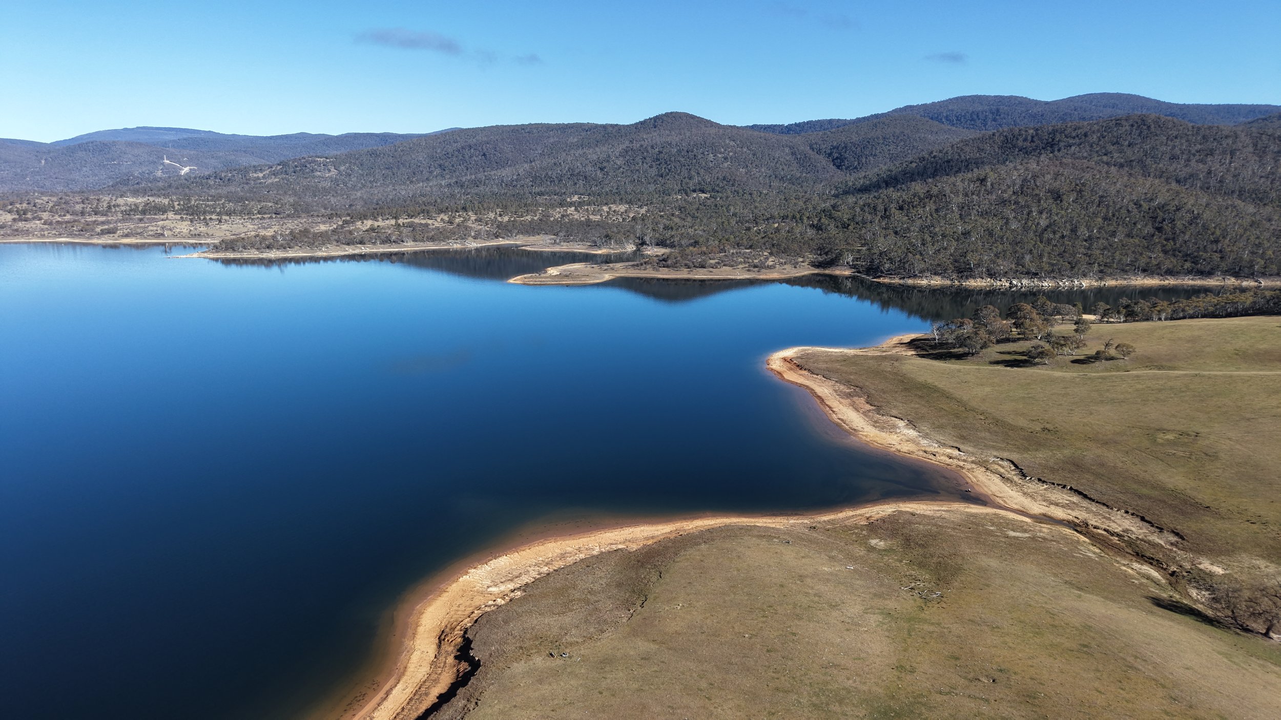 The Eucumbene River Mouth at the northern end of Lake Jindabyne. Looking west towards Perisher.