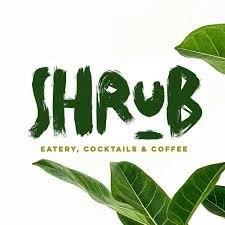 Logo for Shrub, a place offering eatery, cocktails, and coffee, with green leaves around the text.