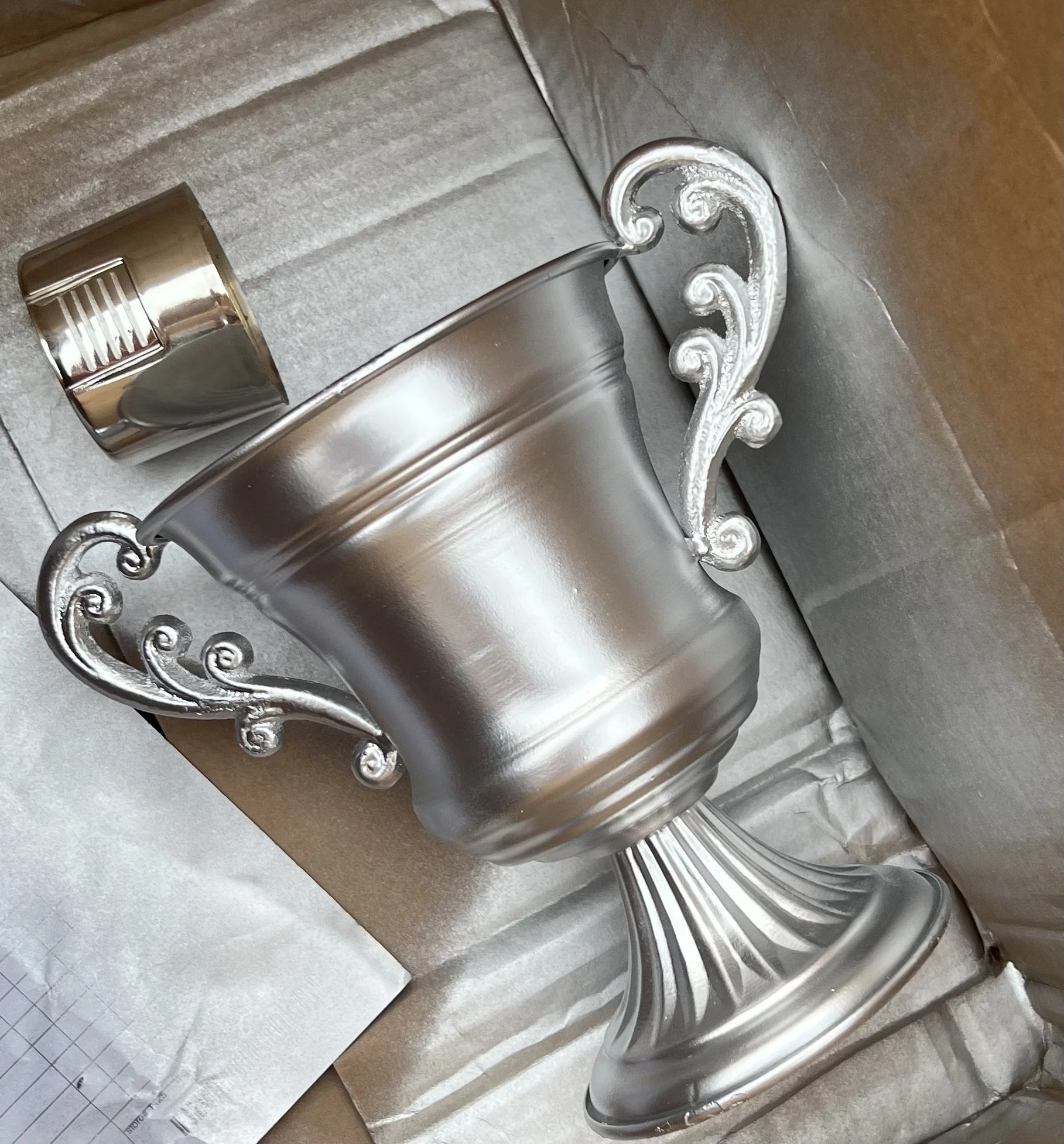 Silver spray painted urn for DIY Football Trophy décor | Sapient Spaces Franklin TN