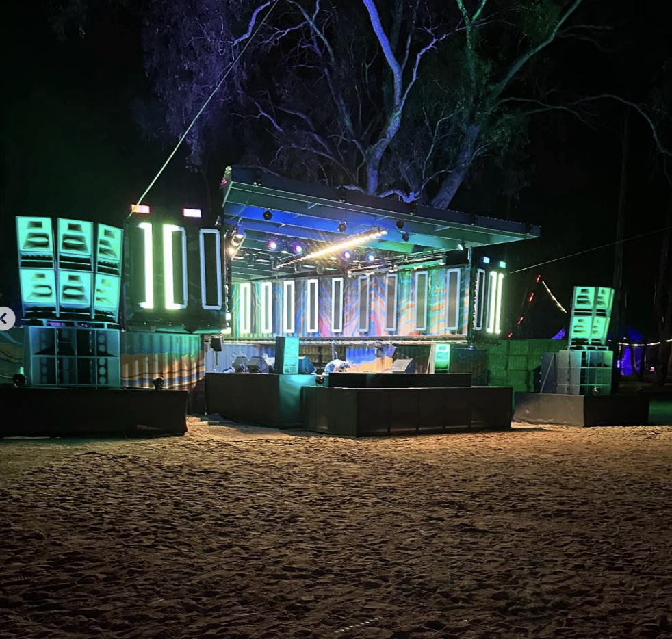 Outdoor music stage with colorful lights