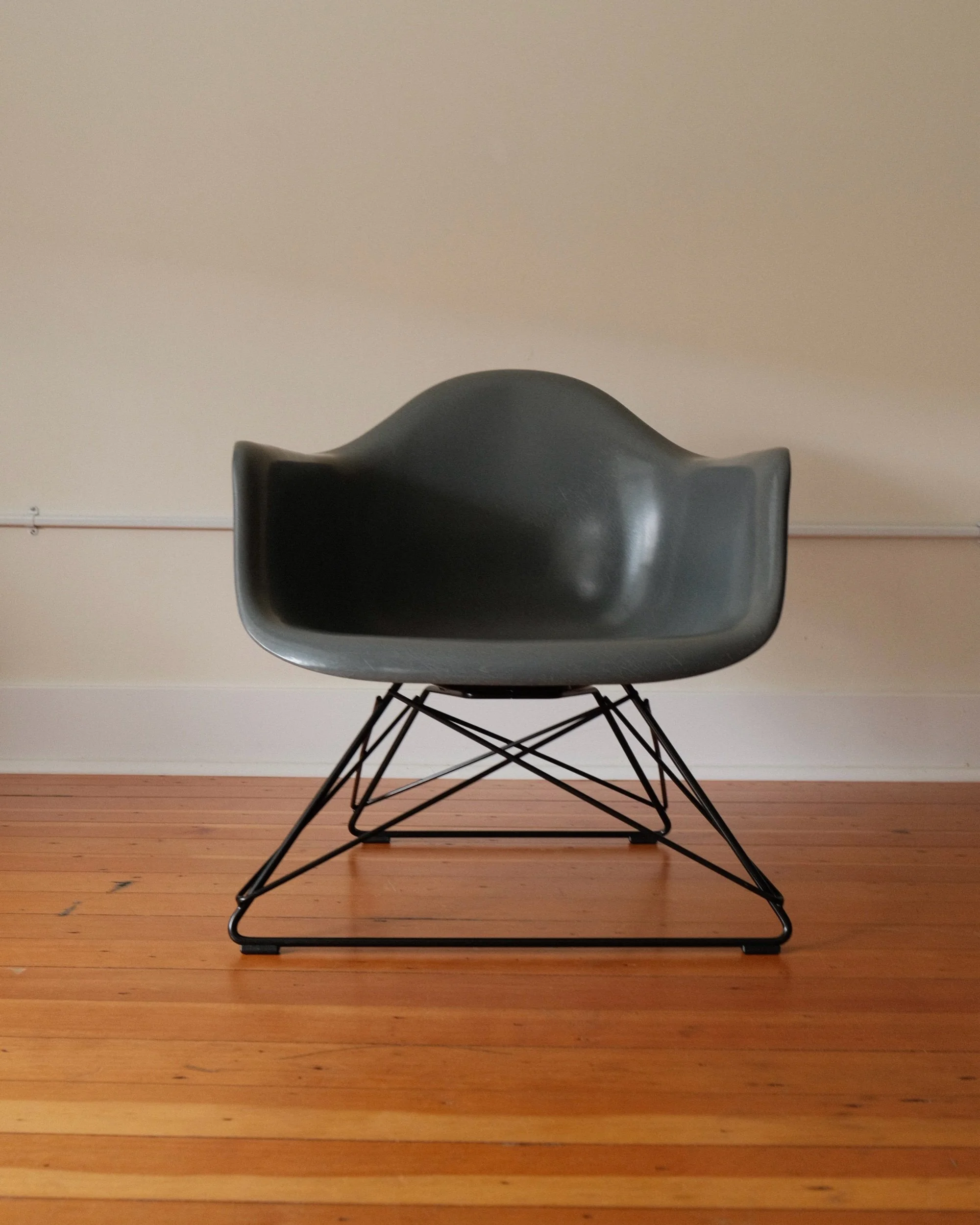 'LAR' Fiberglass Arm shell Chair by Charles and Ray Eames 