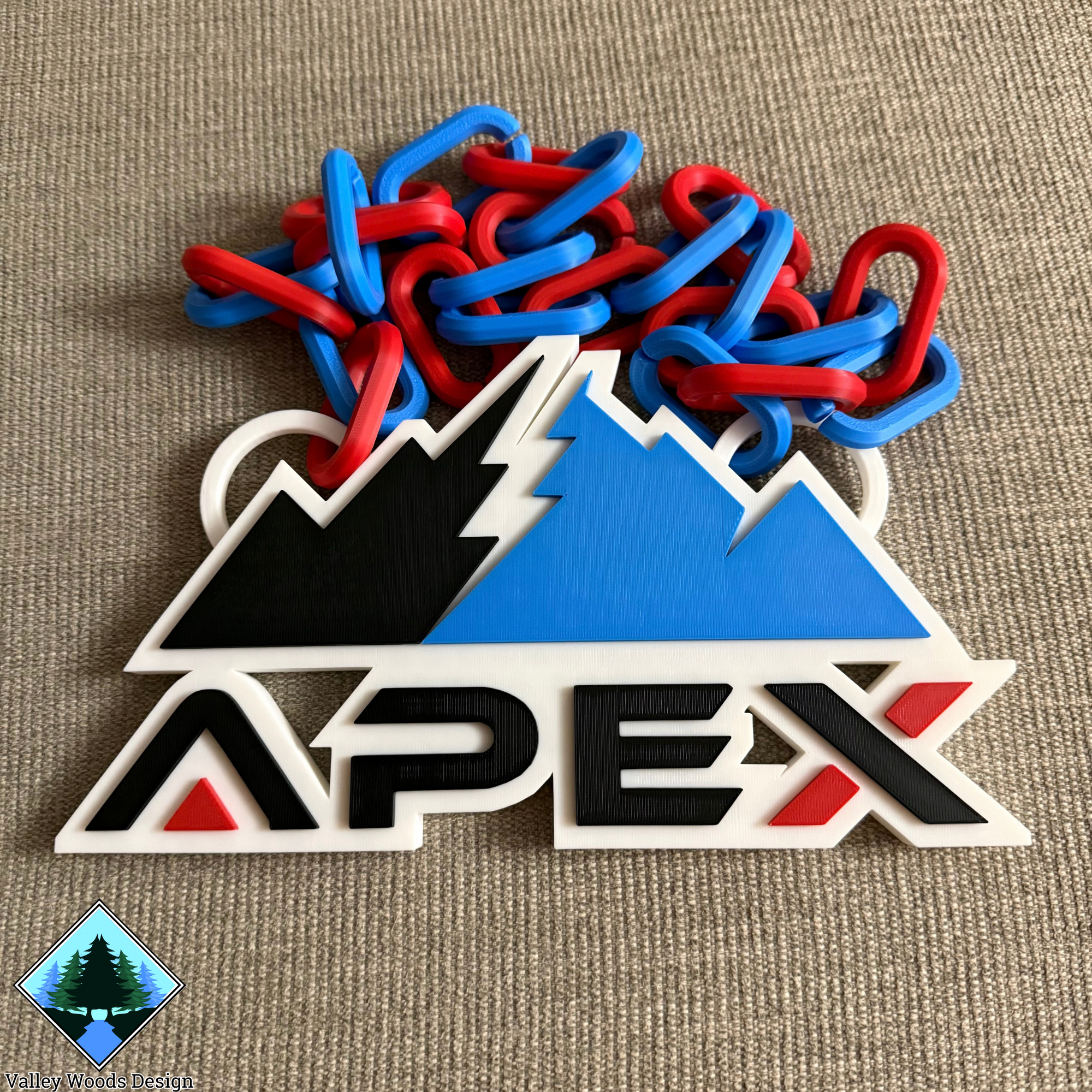 Custom APEX baseball chain featuring the team logo in black, blue, white, and red