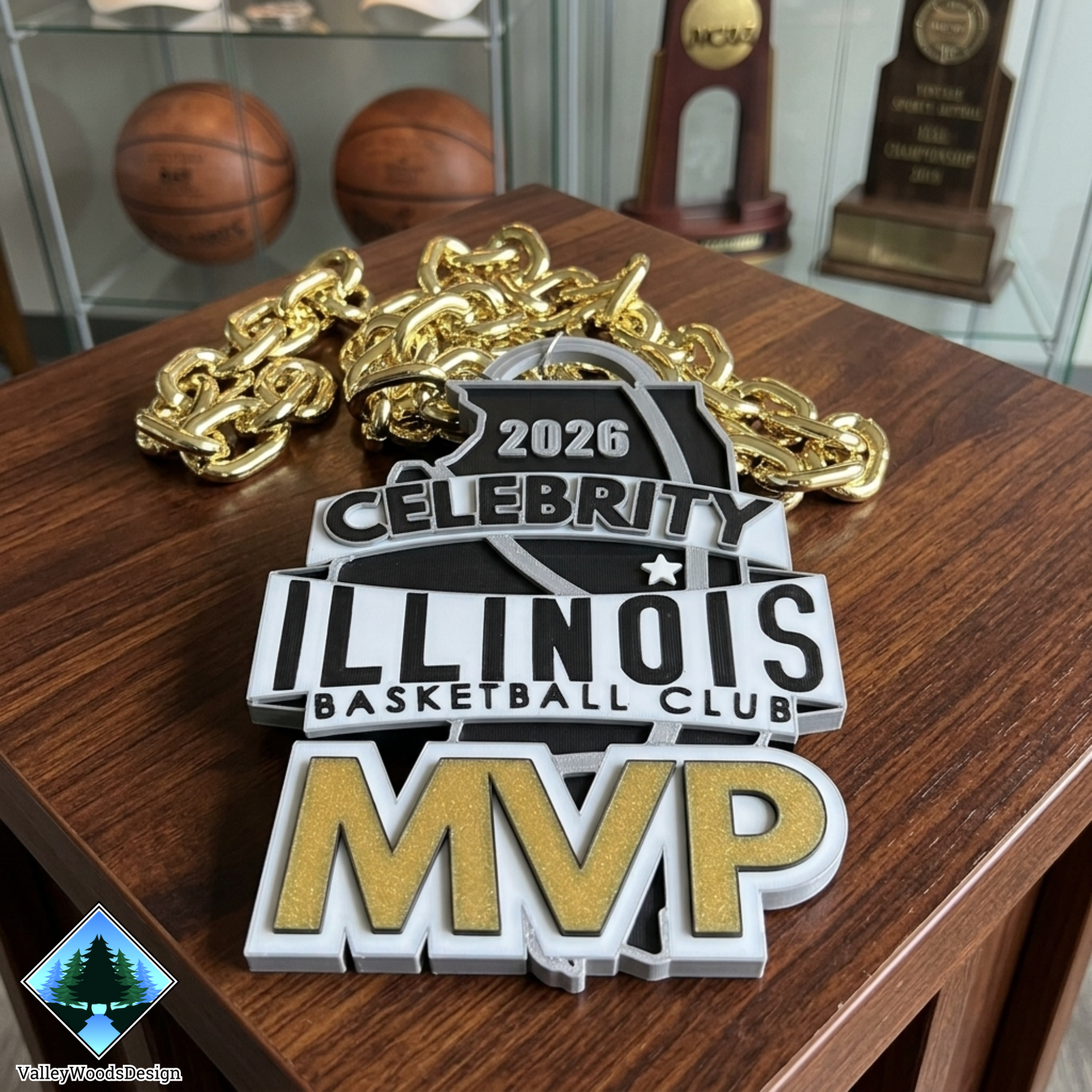 Custom 3D printed MVP chain for the Illinois Basketball Club Celebrity Basketball Game with gold chain and black, white, silver, and gold design.