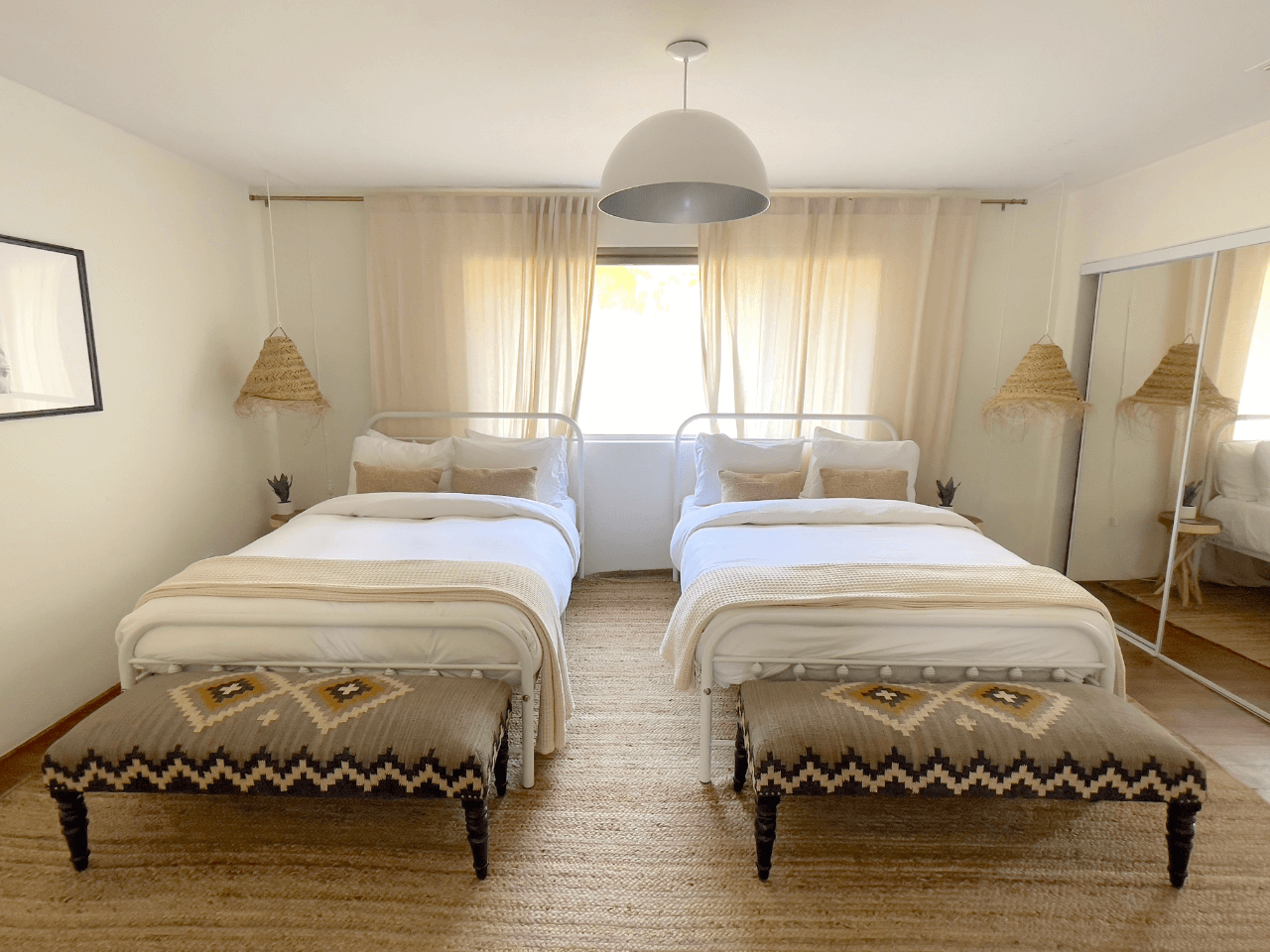 Two Full size beds in a nicely decorated bedroom