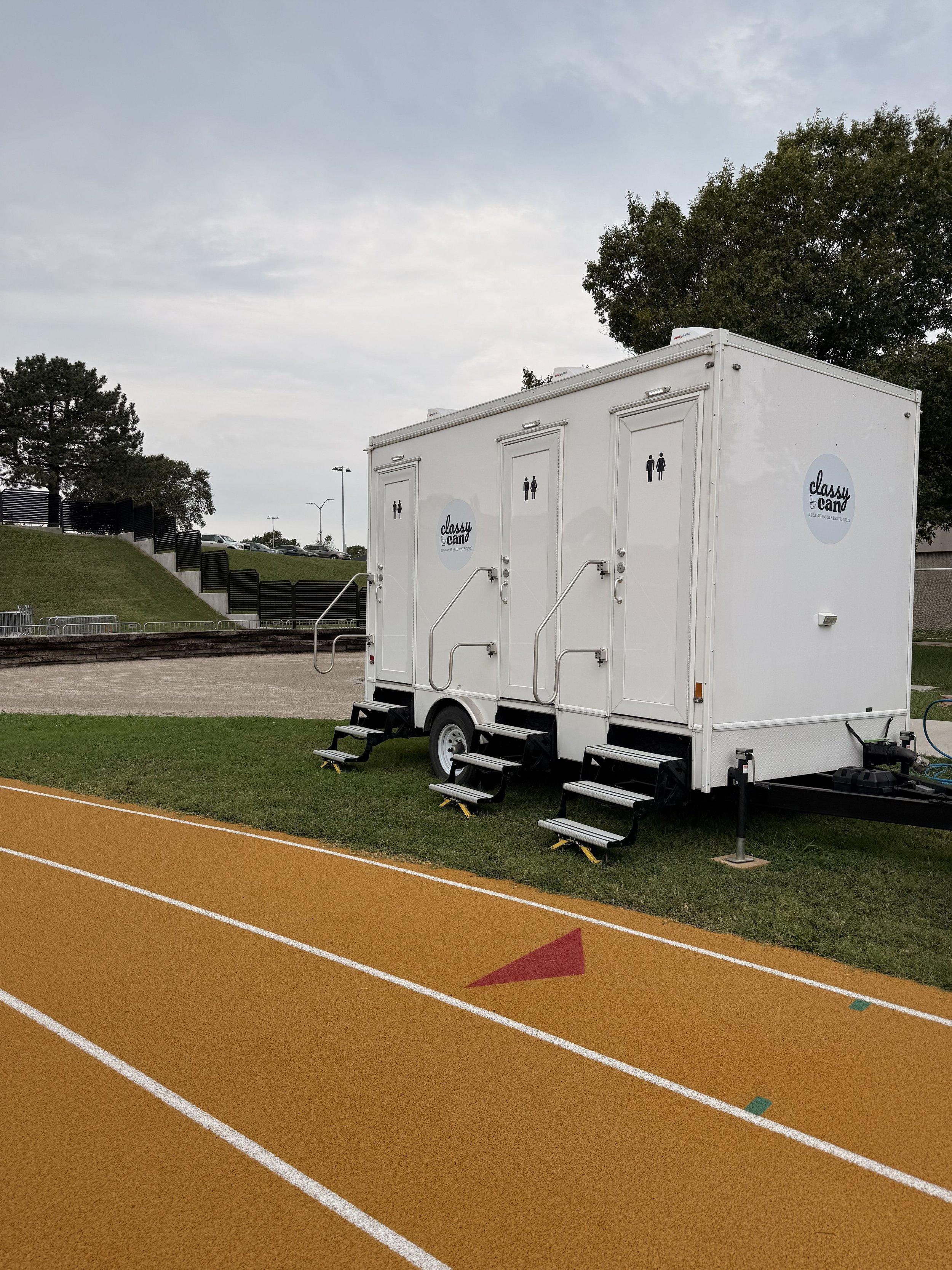 4-stall restroom trailer on a track