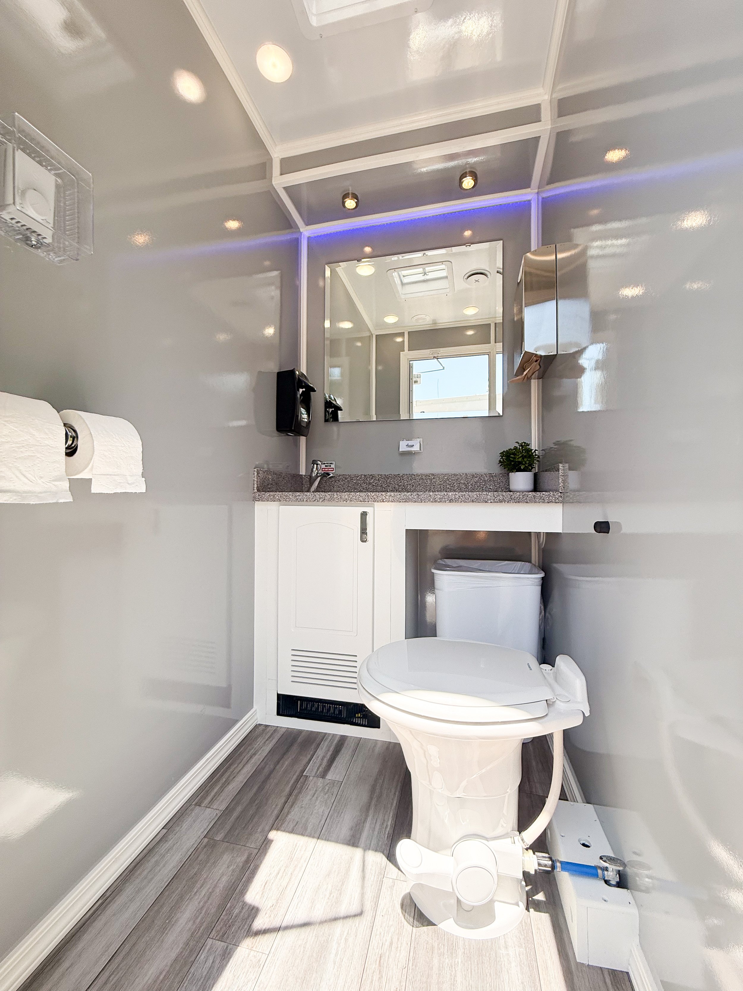 unisex stall in a 4-stall restroom trailer