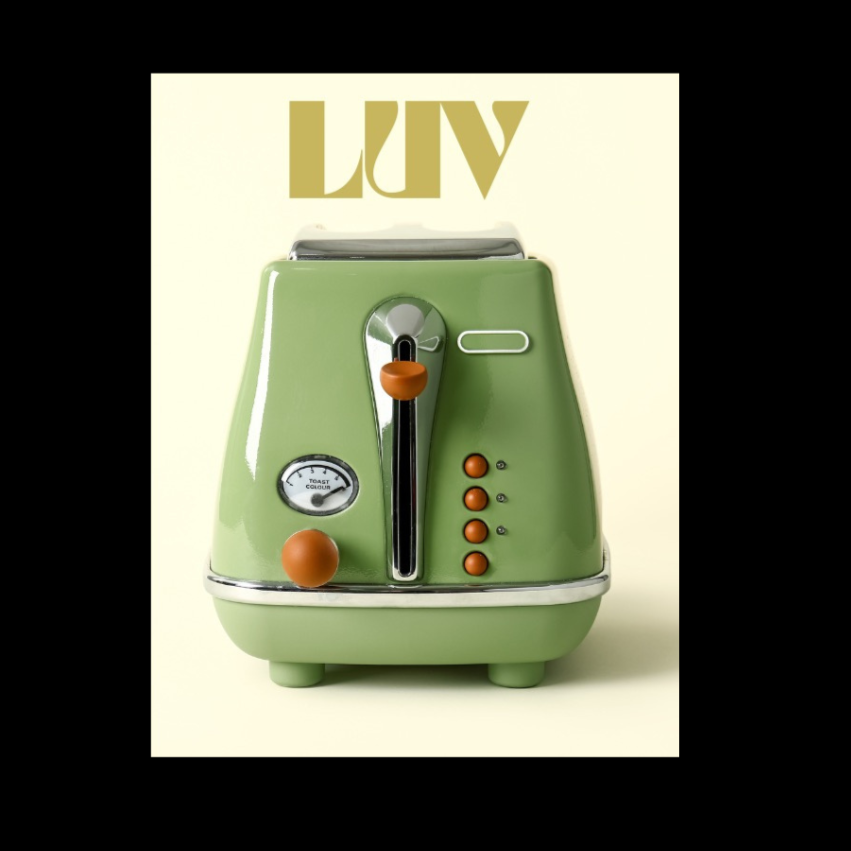 A vintage, mint-green toaster with orange control knobs and a toast ready indicator, placed against a light-colored background with the letters "LUV" above it.