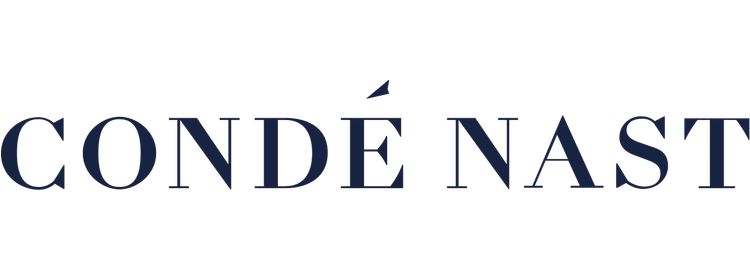 Condé Nast logo in dark blue font with an accent on the letter E.