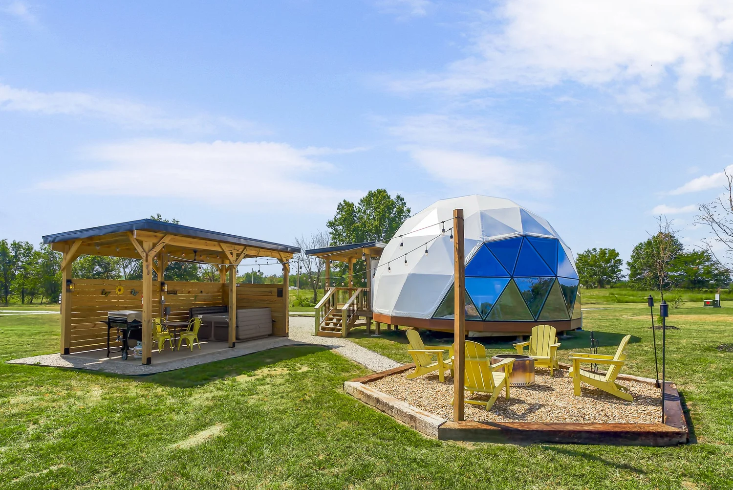 Pop Culture Camp geodesic glamping dome with covered gazebo and grilling area