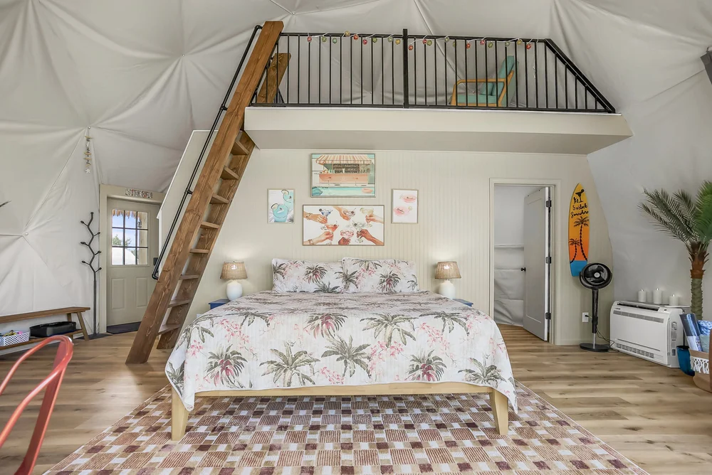 Tropical decor, king bed, and loft in 5 O’Clock Somewhere