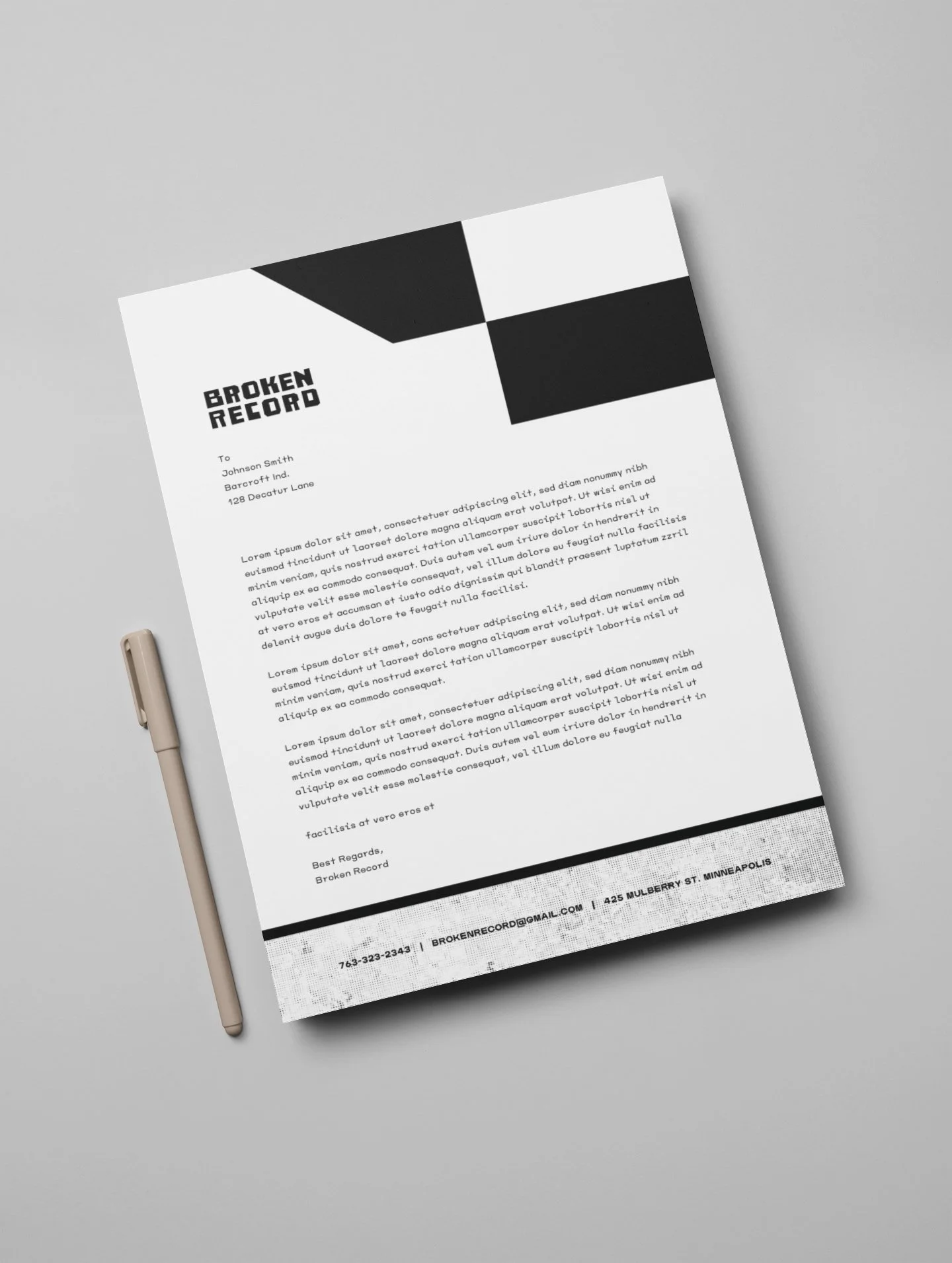 minimalistic-mockup-of-an-a4-letterhead-next-to-a-pen-over-a-flat-backdrop-27165.jpg