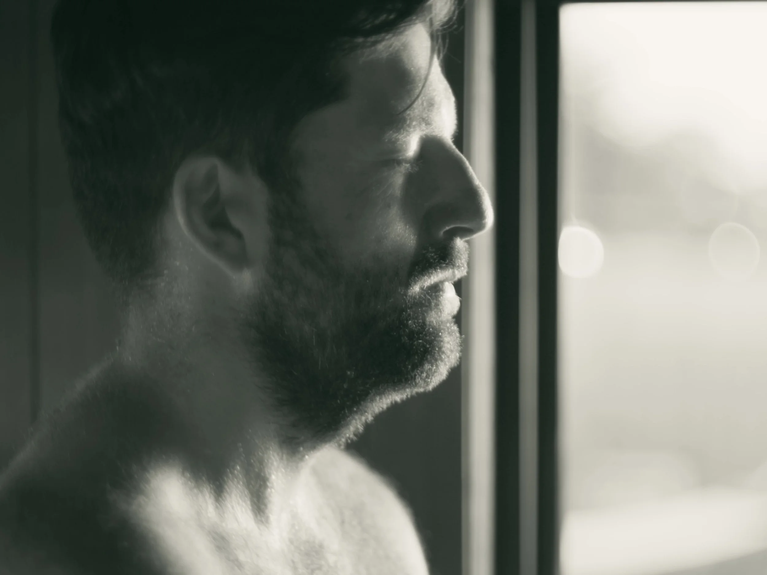 A photo of a man in a sauna, taken as part of a commerical campaign for a local wellness centre in north Melbourne.