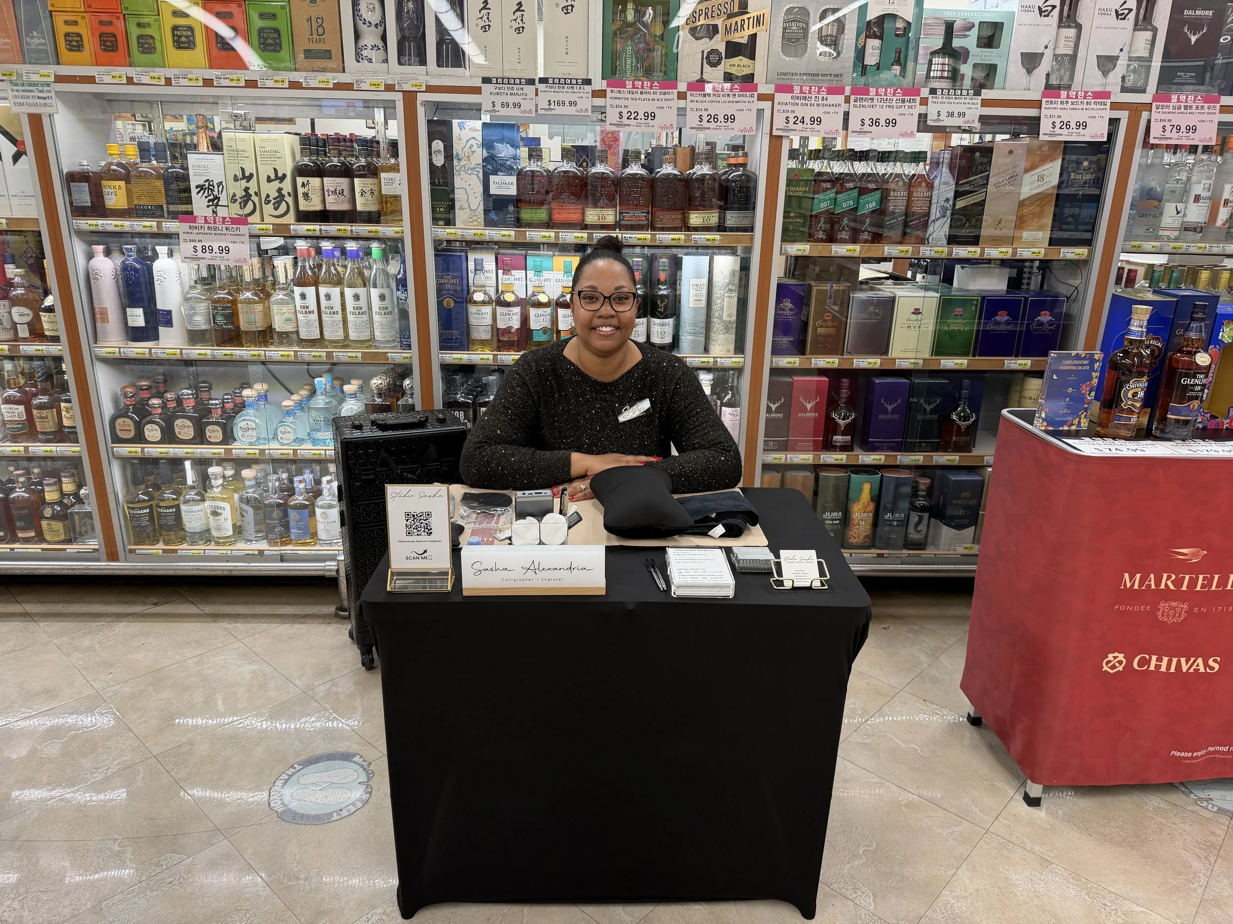 Woman sitting at a table.