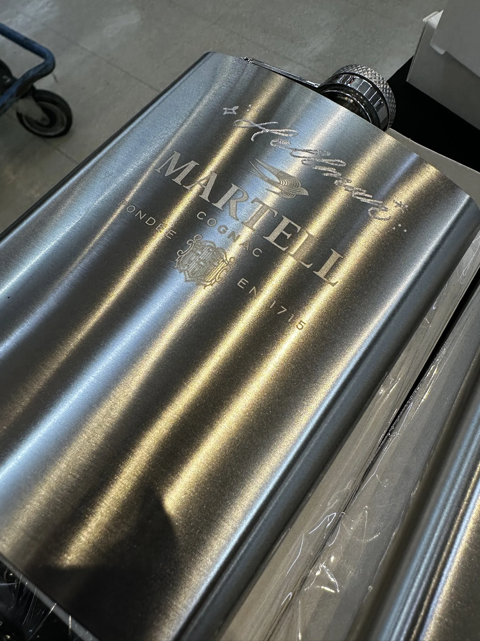 Engraved Martell silver drinking flask.