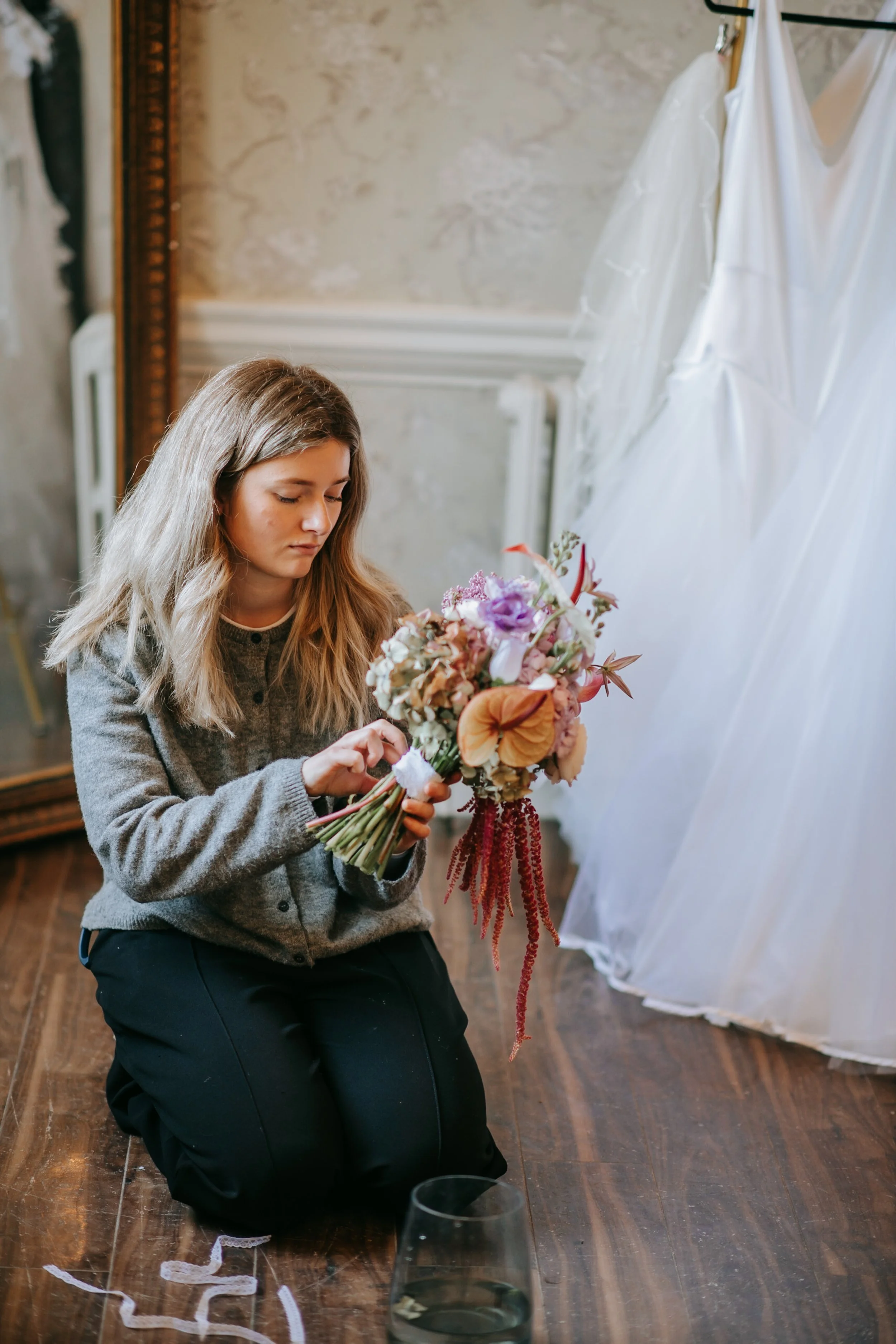 Nina Isobel Florals - florist at work with bridal bouquet