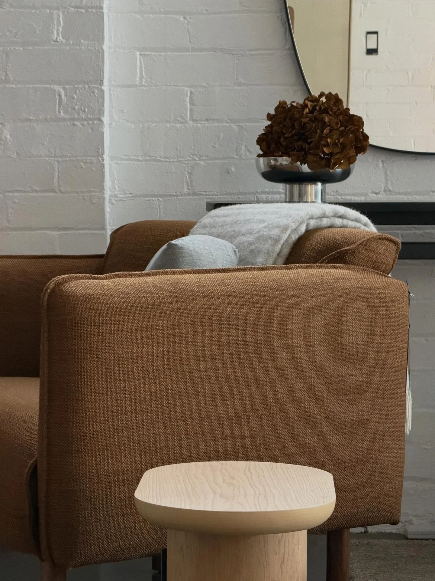 Slow mornings hit different in the Dream Armchair, with the Seb Side Table and our favourite mirror catching all the festive glow. ✨