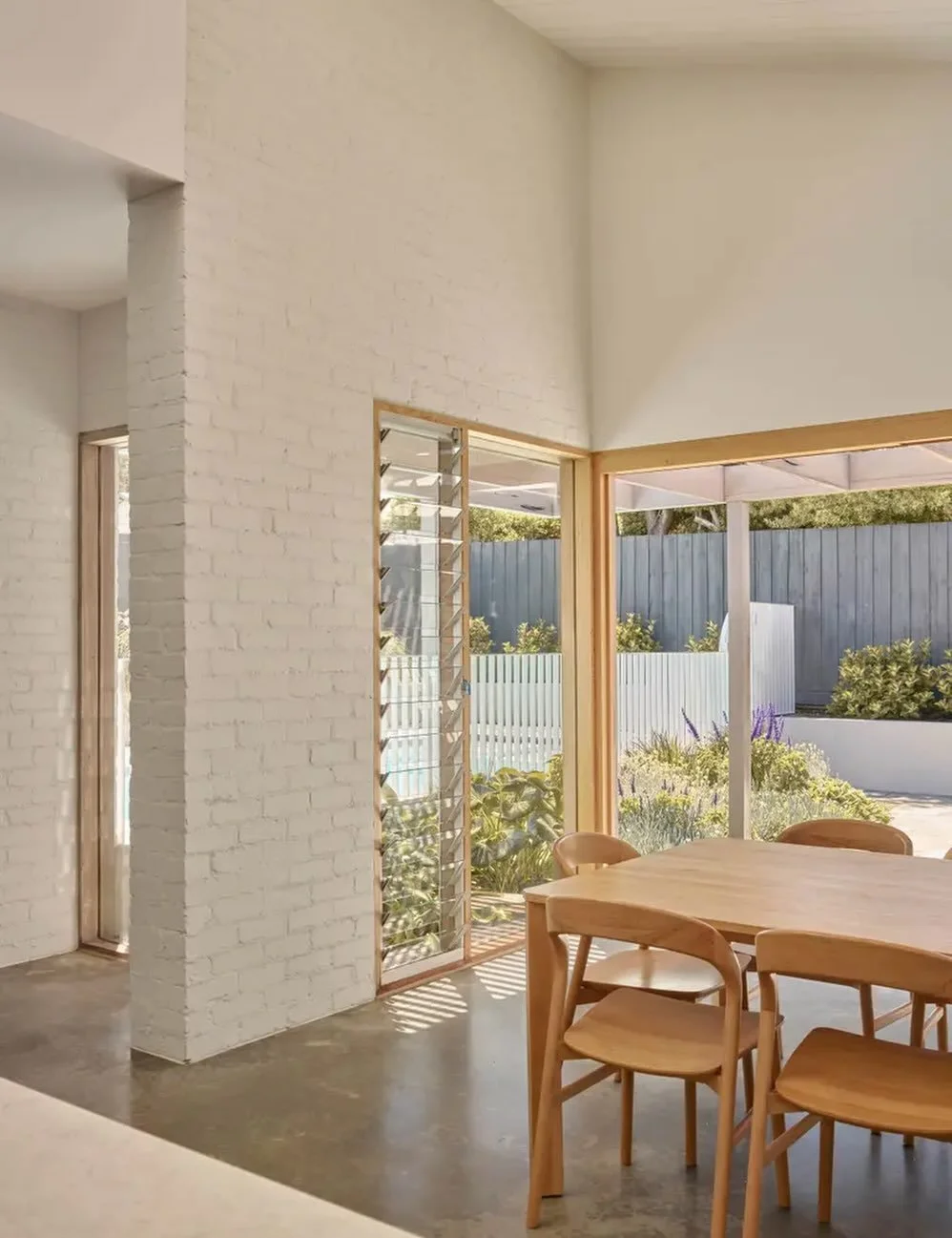 Studio Tom &amp; Sense of Space Architects have nailed keeping the Edwardian charm while making it perfect for modern living. Love how the interiors flow seamlessly into the outdoors - the Tempo dining chair and Aksel dining table, fit beautifully he