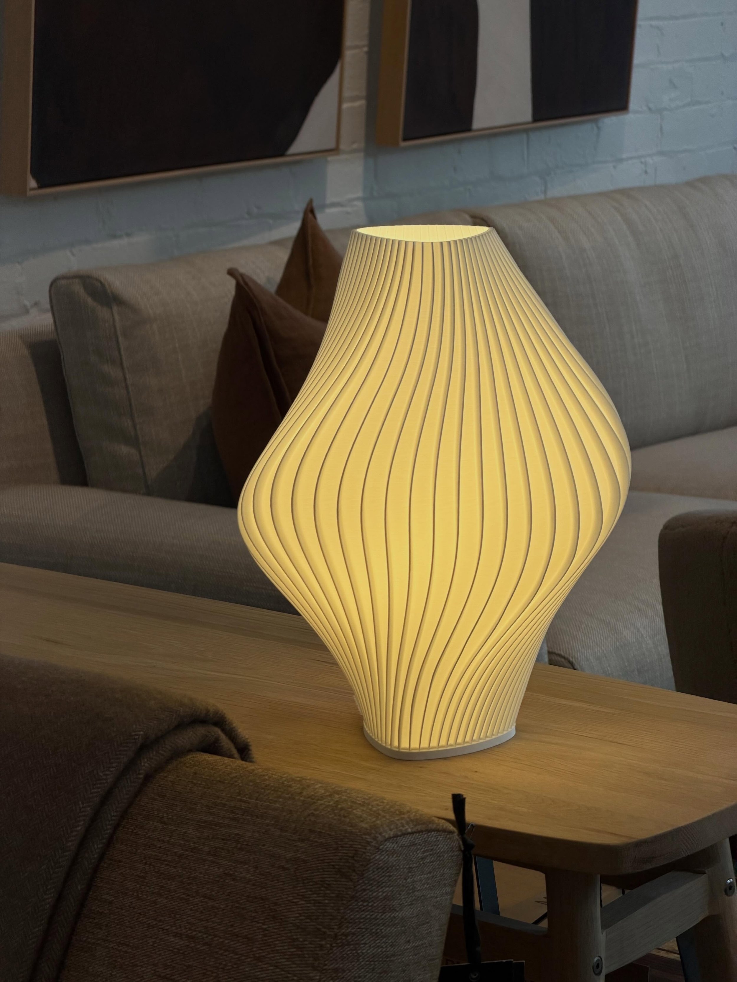Locally made in Melbourne using 3D printing, sculptural form and soft, ambient light.

Pleat Lamp by Namami Studio.
