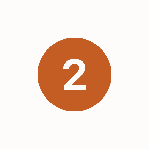 Een oranje cirkel met het cijfer 2 in witte tekst ernaast.