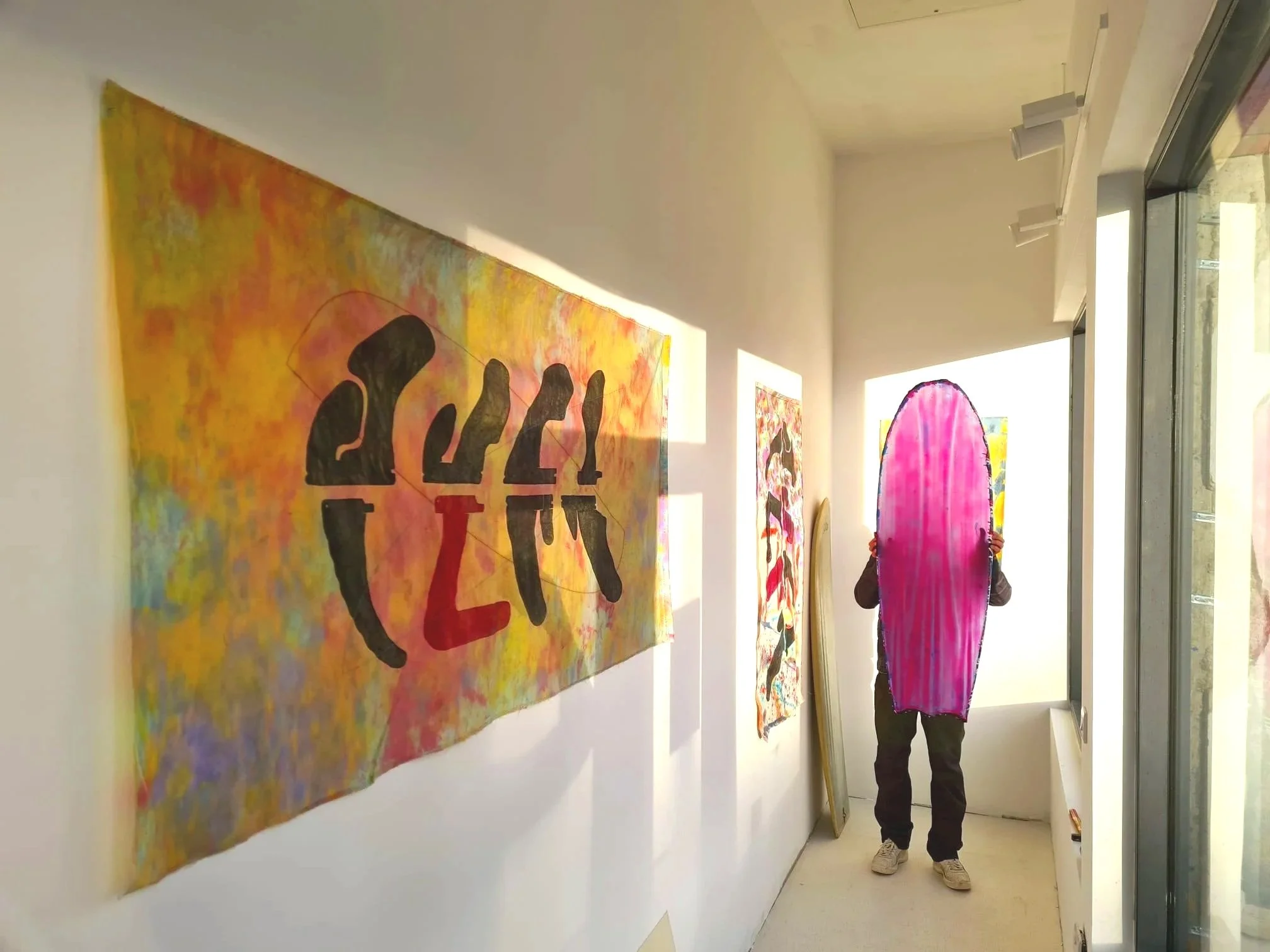 Wake in Gallery 1 with woodblock prints by Ian Jermyn and resin sculpture by Elvis Beetham