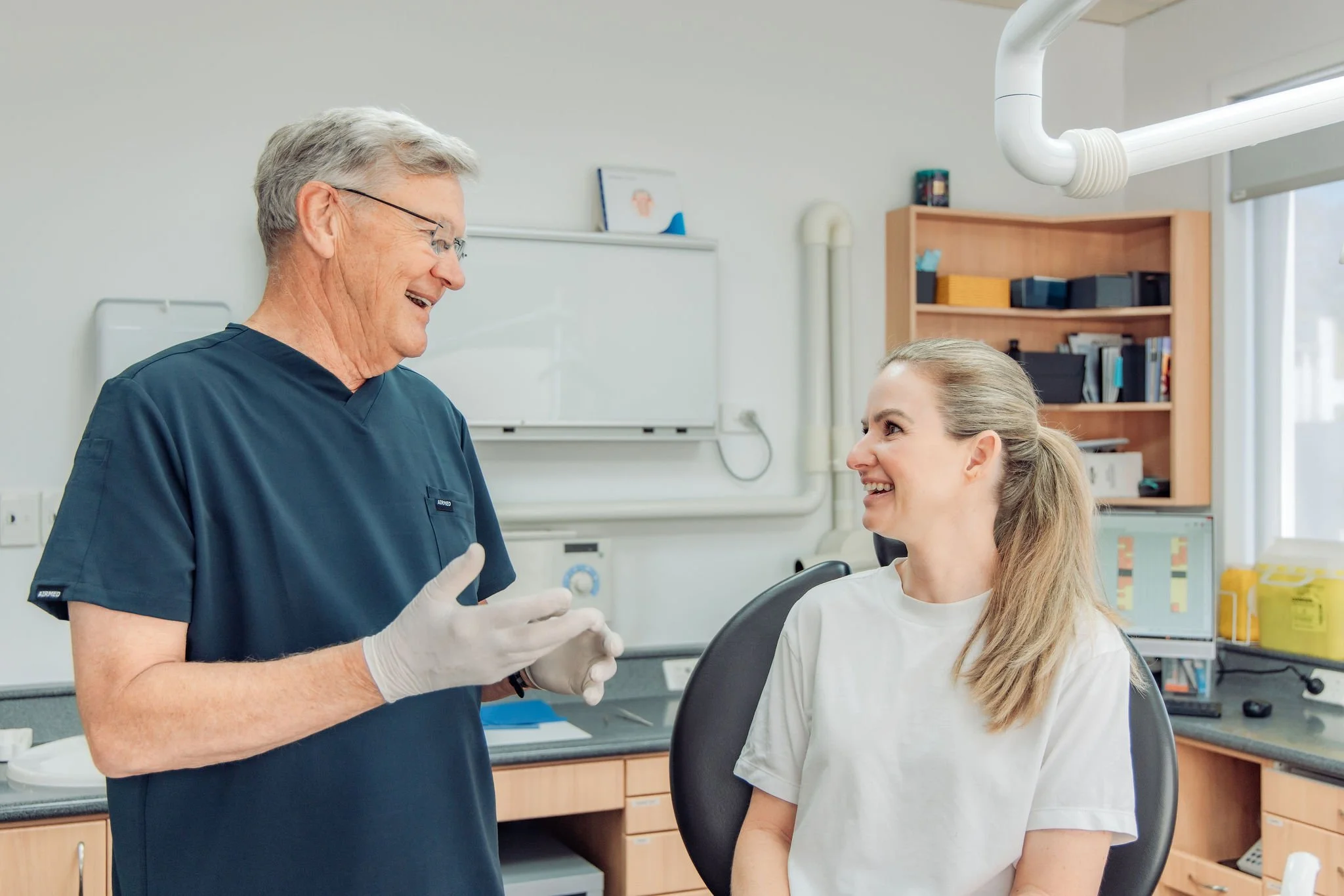 Teeth Whitening Dentist Dr Karsten talking with his patient