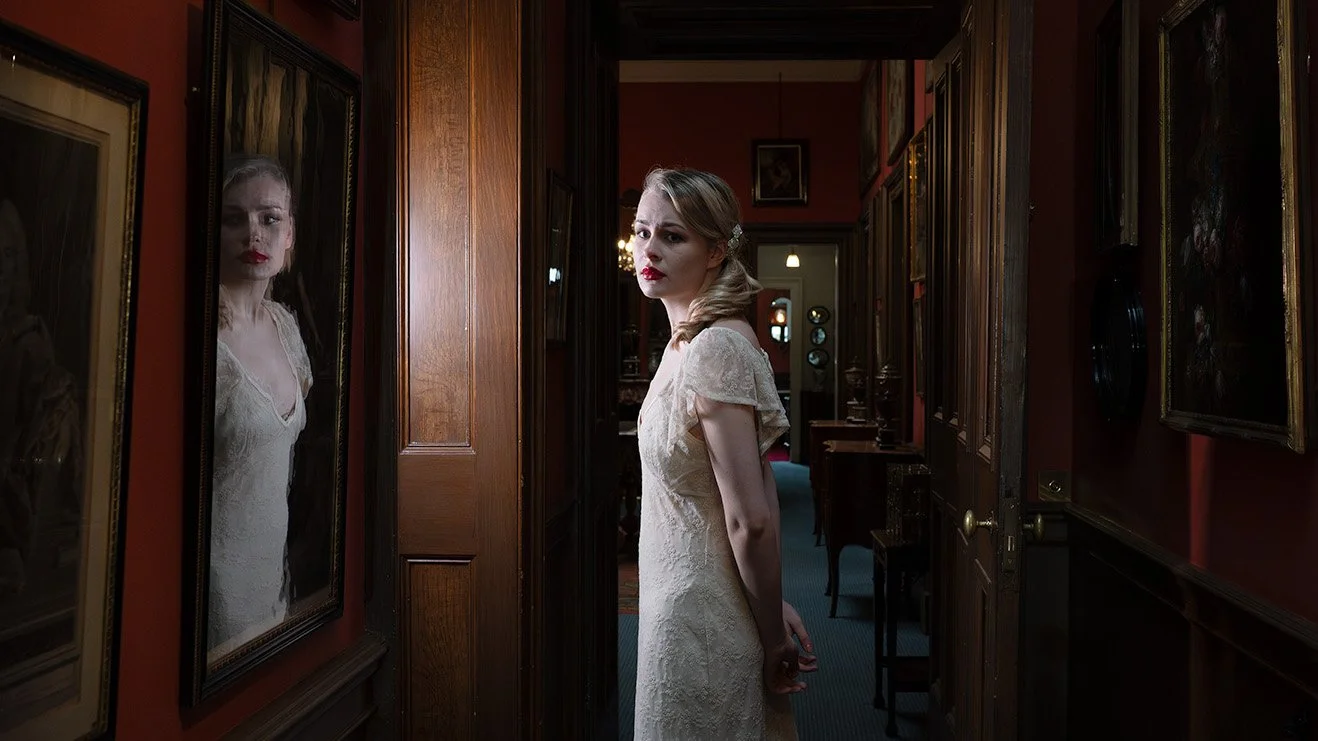 WomanInWhite02 16x9_WEB.jpg