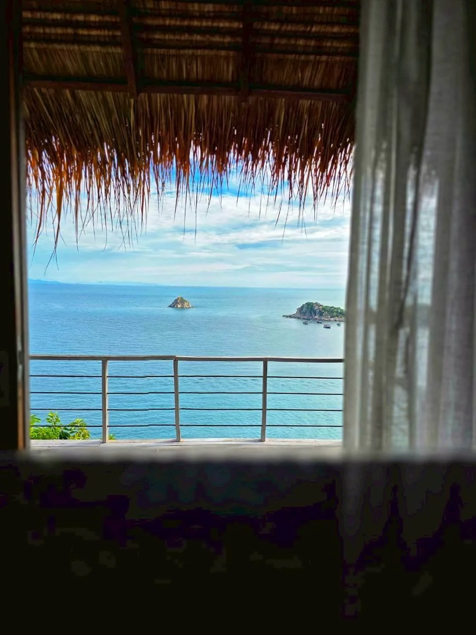 Ocean view through sheer curtains from bedroom, Villa Pavana private villa Koh Tao
