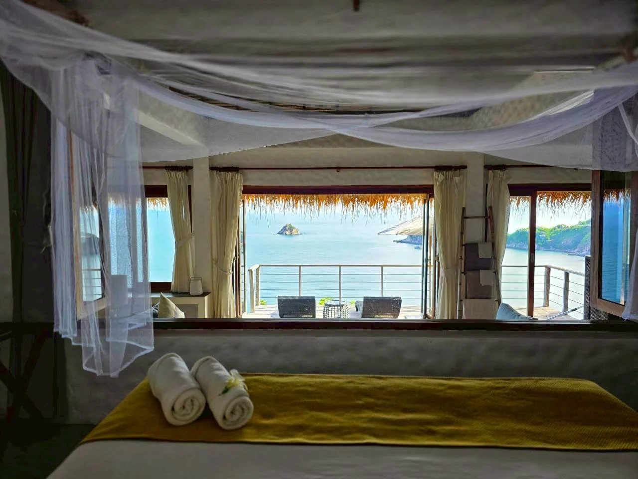 Ocean view through sheer curtains from bedroom, Villa Pavana private villa Koh Tao