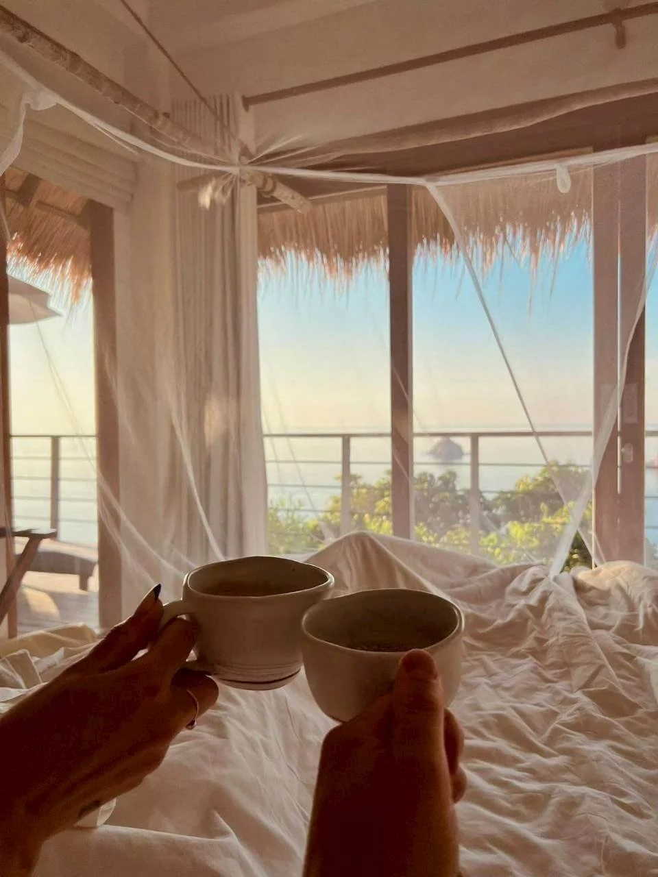 Breakfast in bed with ocean view at Villa Pavana, luxury villa Koh Tao Thailand
