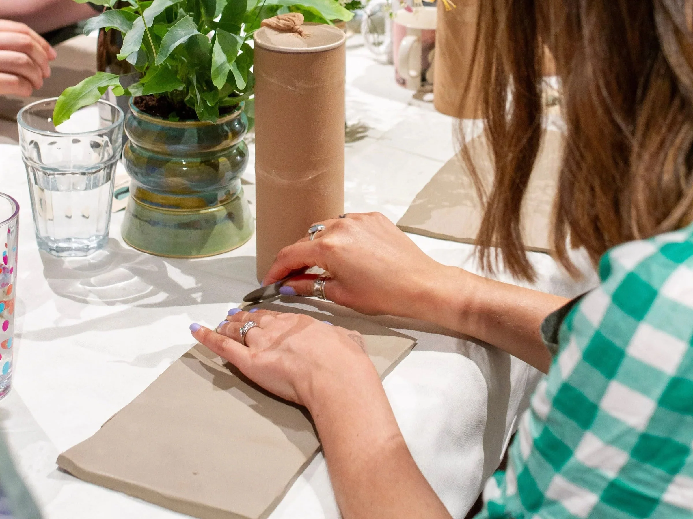 Lunch and learn pottery wellbeing workshop led by a professional potter for corporate teams in Manchester
