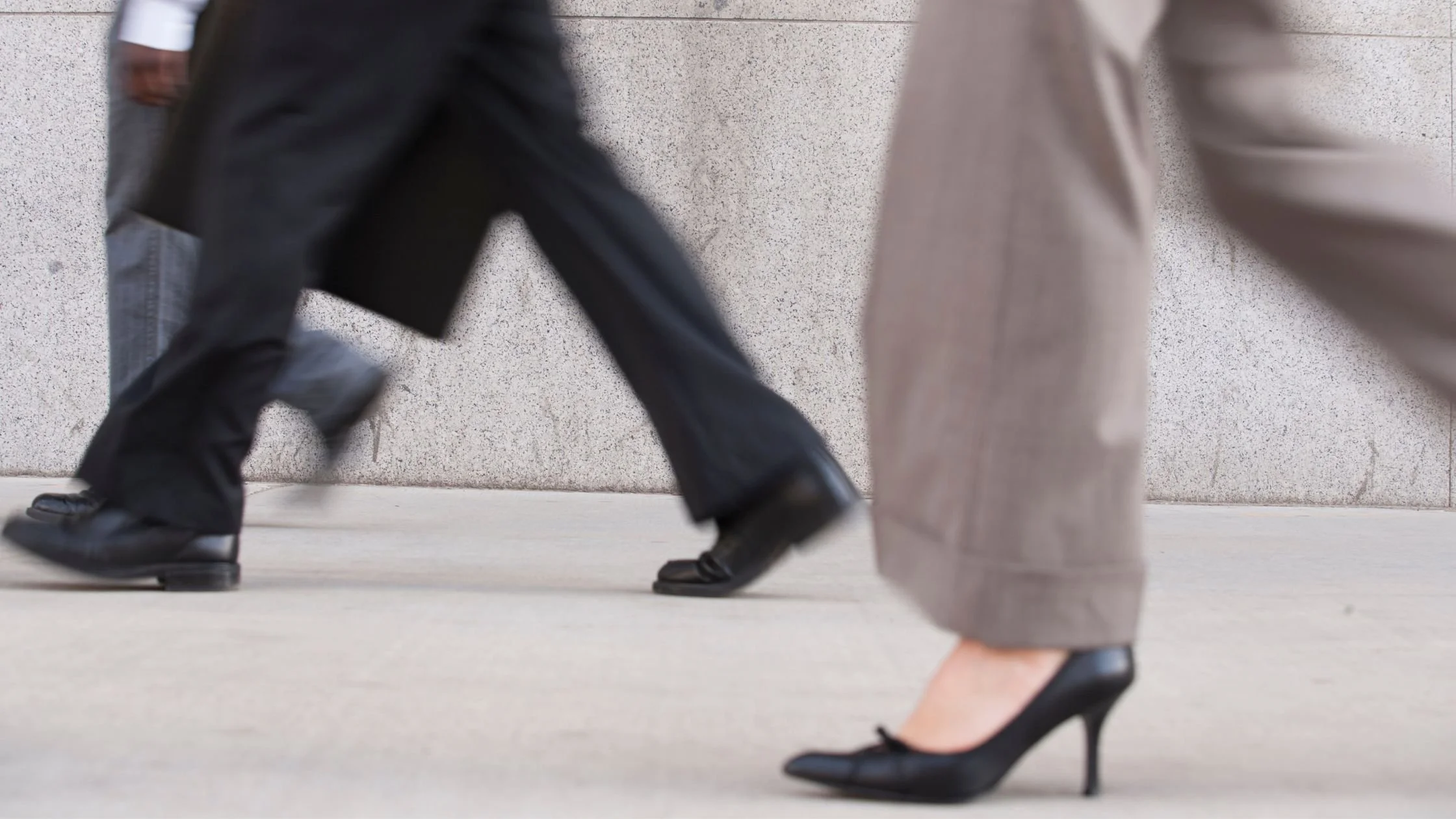 People walking in different directions symbolising career change and transition