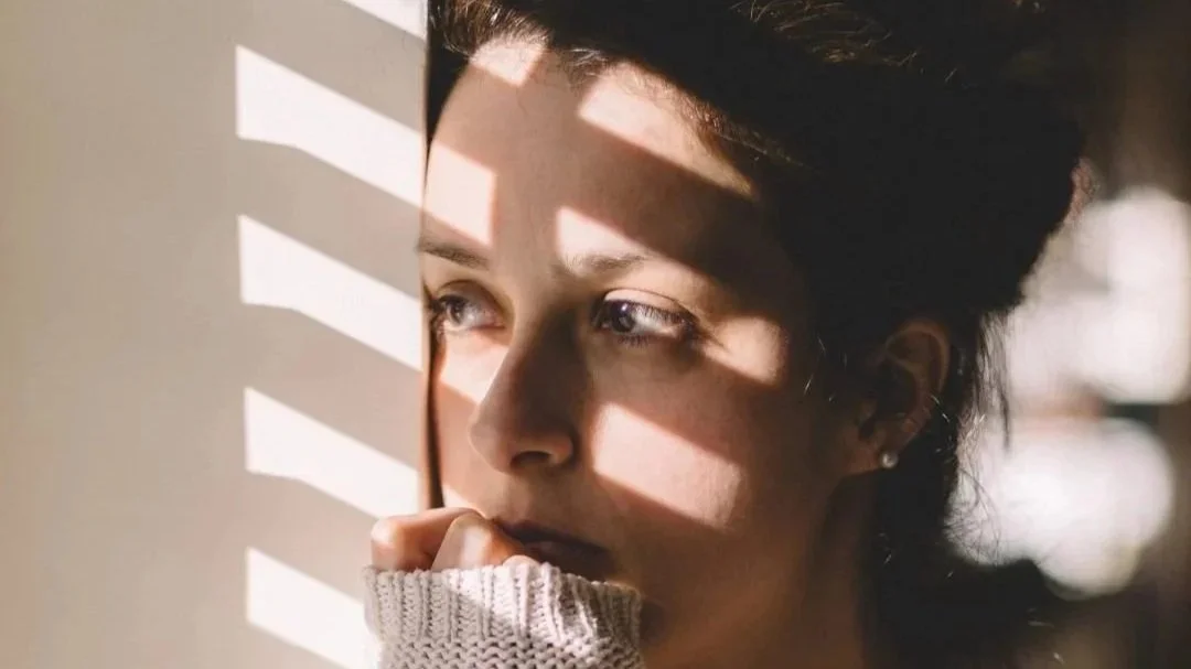 Woman reflecting on career clarity and career direction